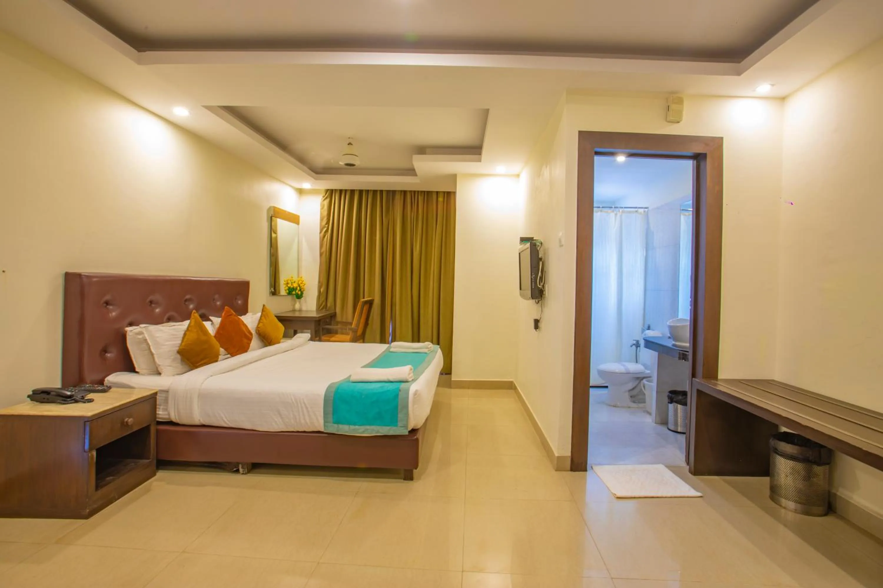 Bed in Nitya Resort, Calangute