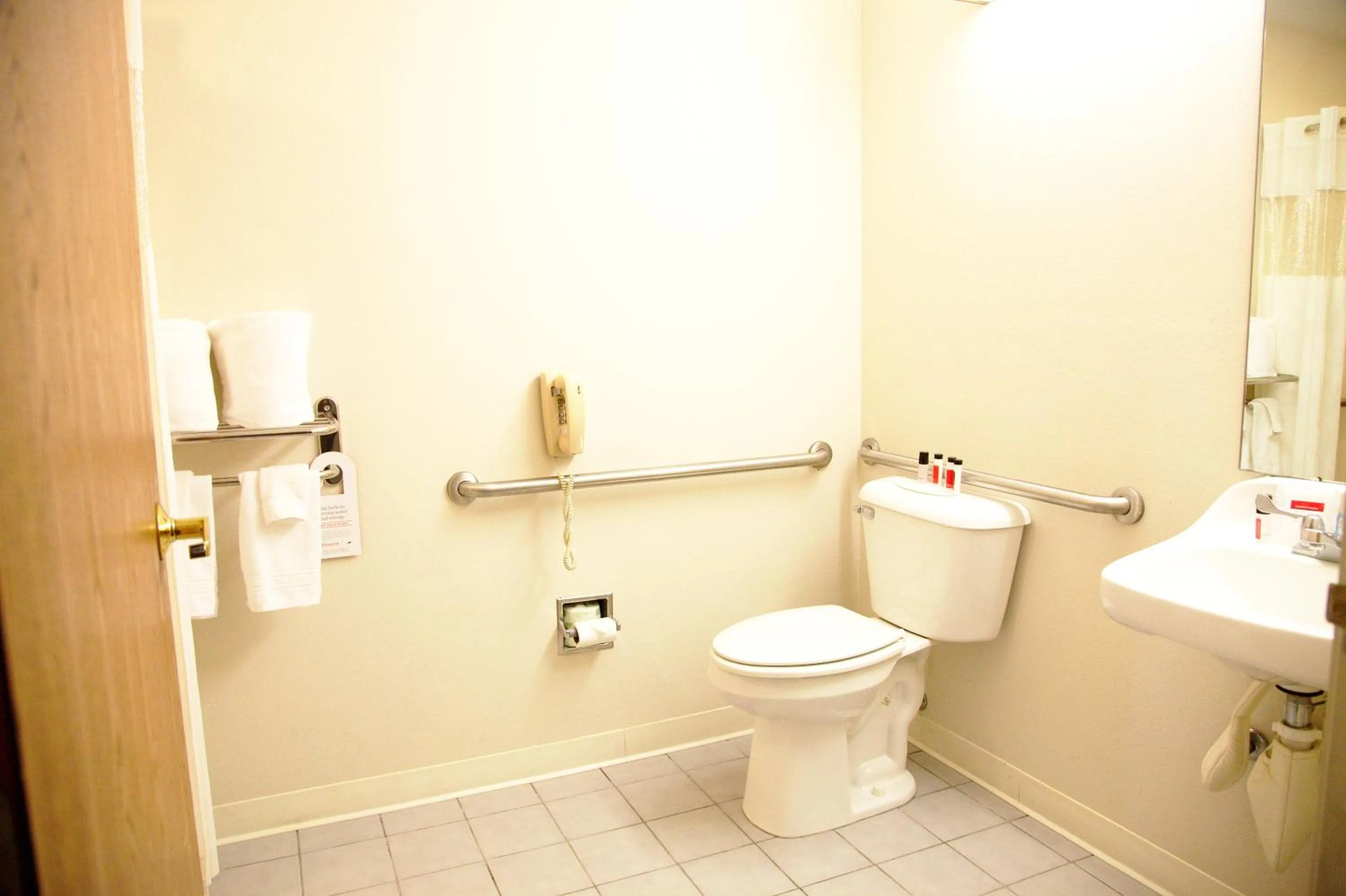 Bathroom in Ramada Limited by Wyndham, Bloomington I-55 & I-74 IL