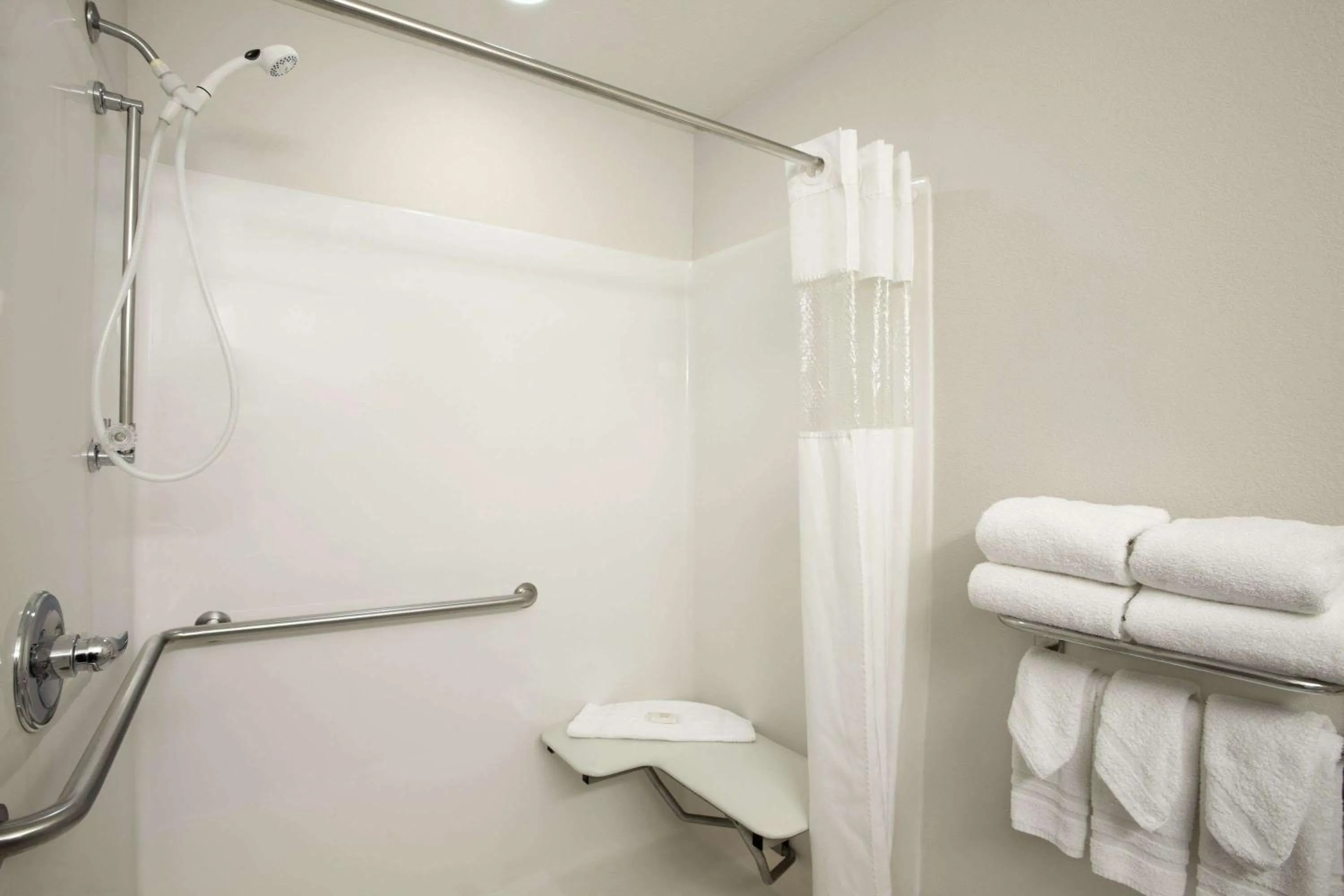 Bathroom in Ramada Limited by Wyndham, Bloomington I-55 & I-74 IL