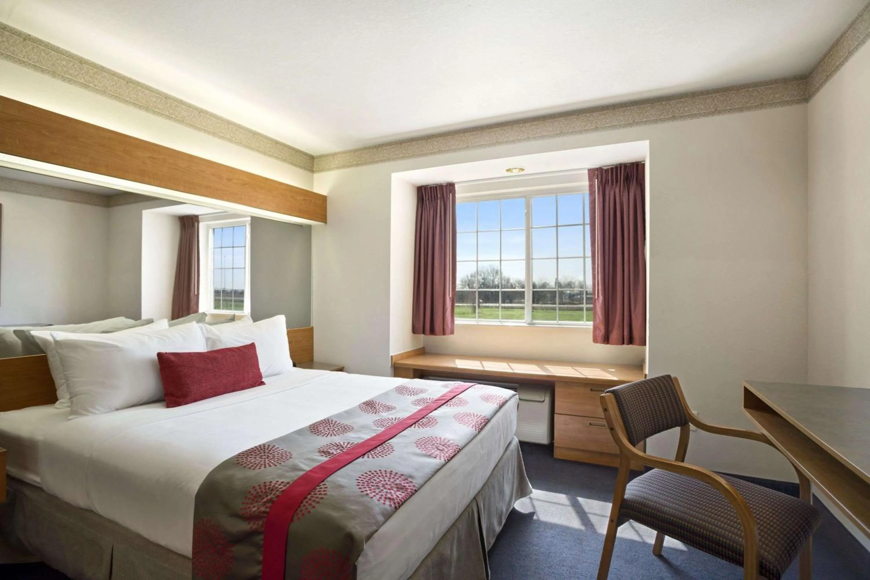 Photo of the whole room, Bed in Ramada Limited by Wyndham, Bloomington I-55 & I-74 IL