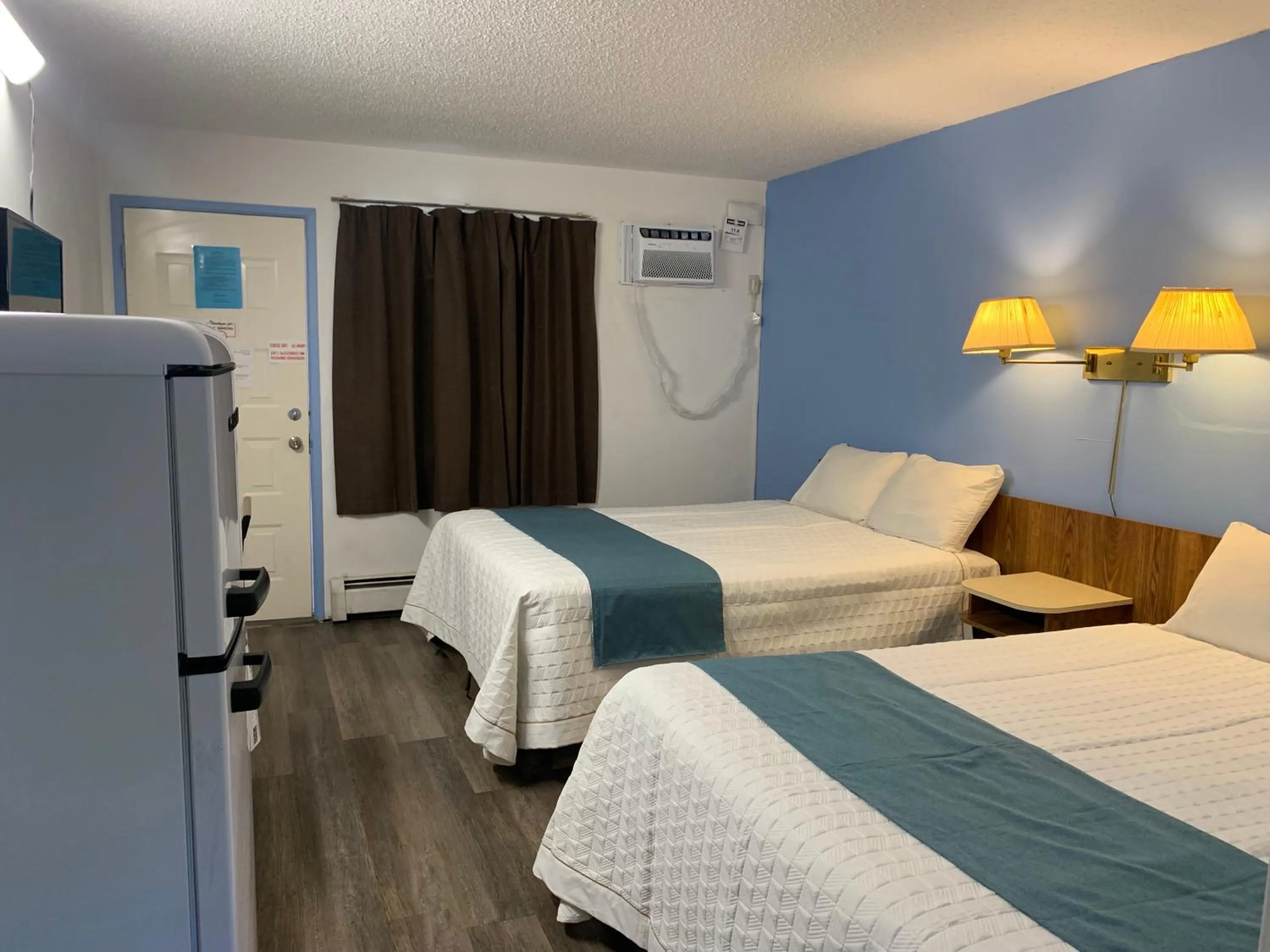 Bed in Swiss Sunset Inn