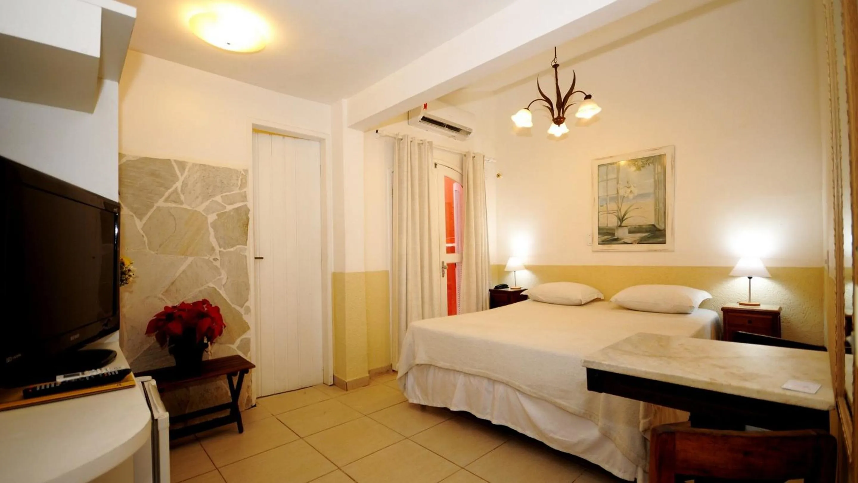 Bed in Pousada El Parador