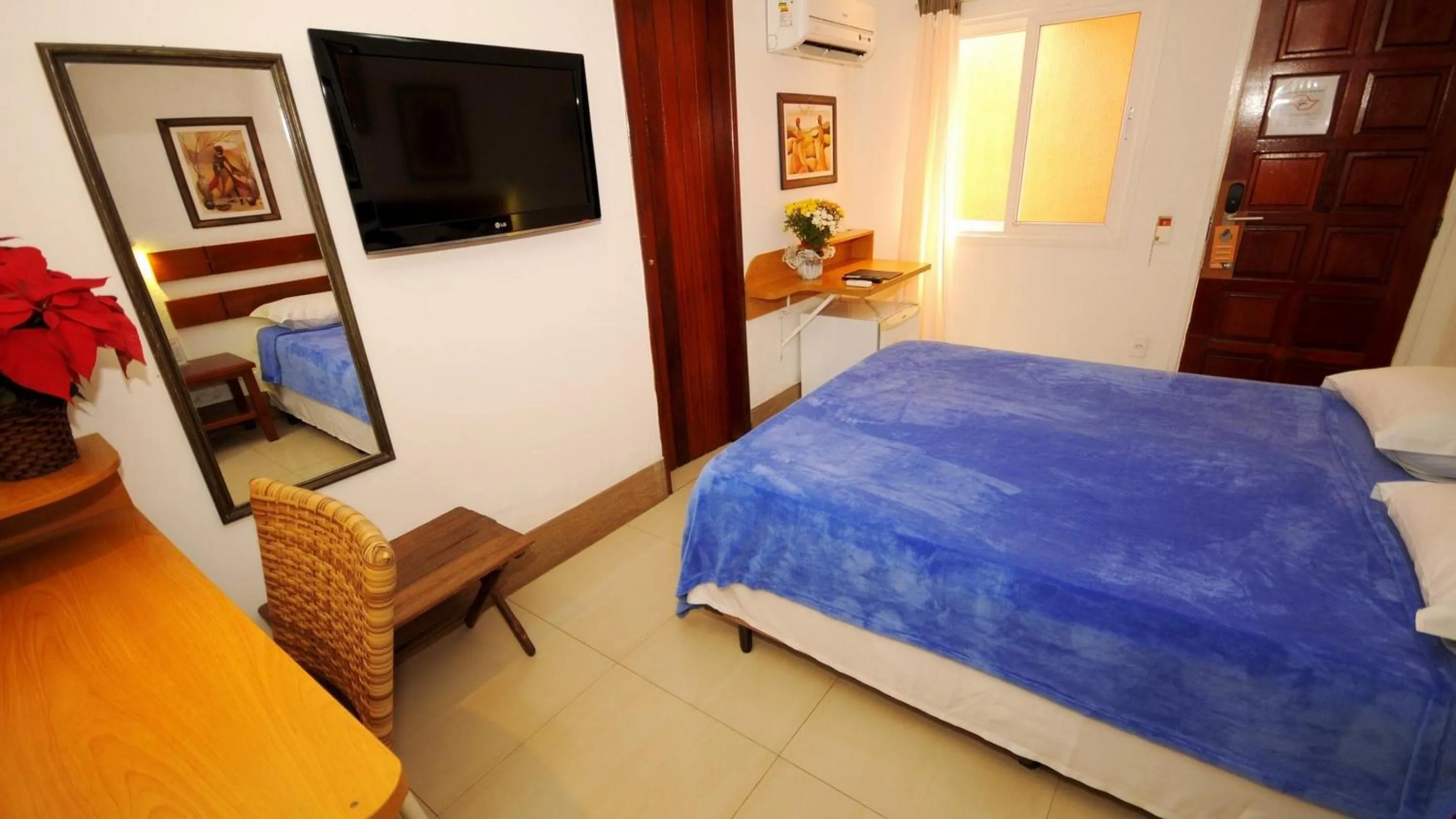 Bed in Pousada El Parador