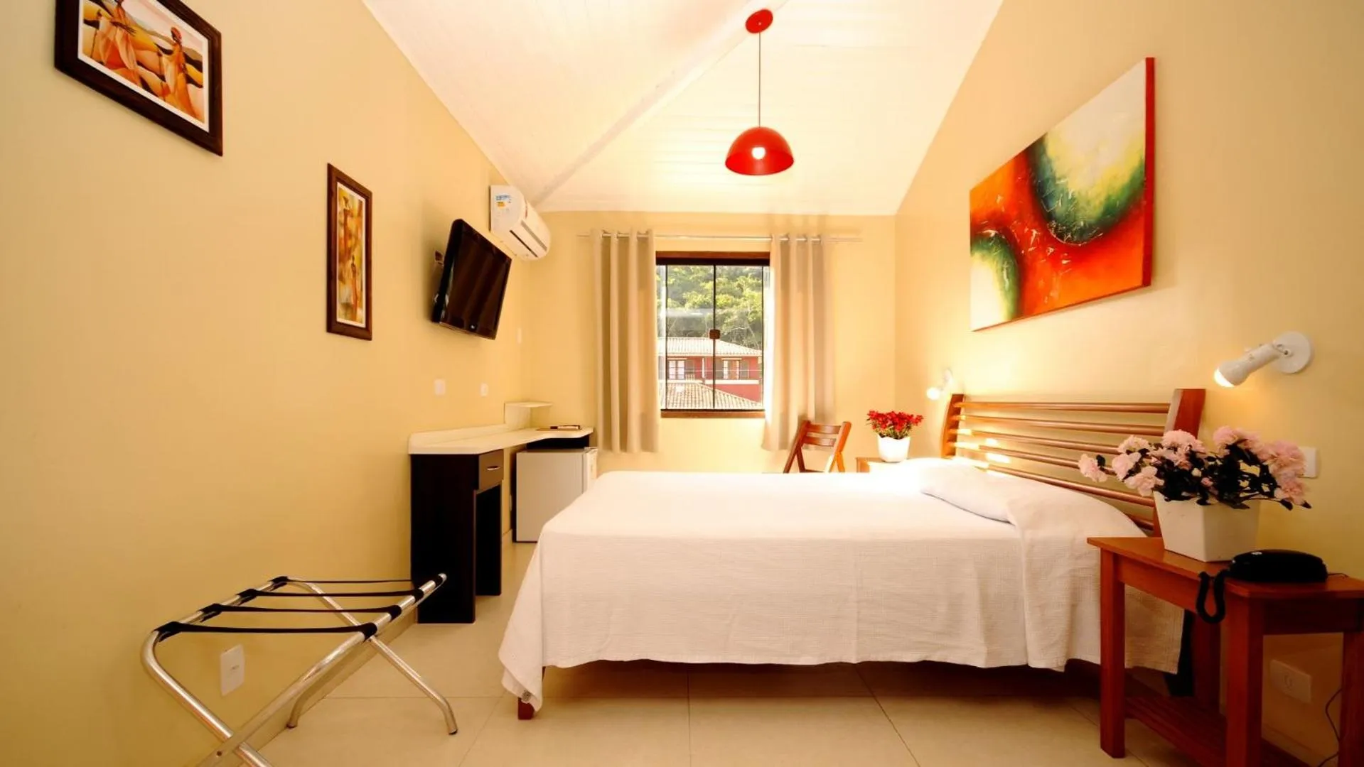 Bed in Pousada El Parador