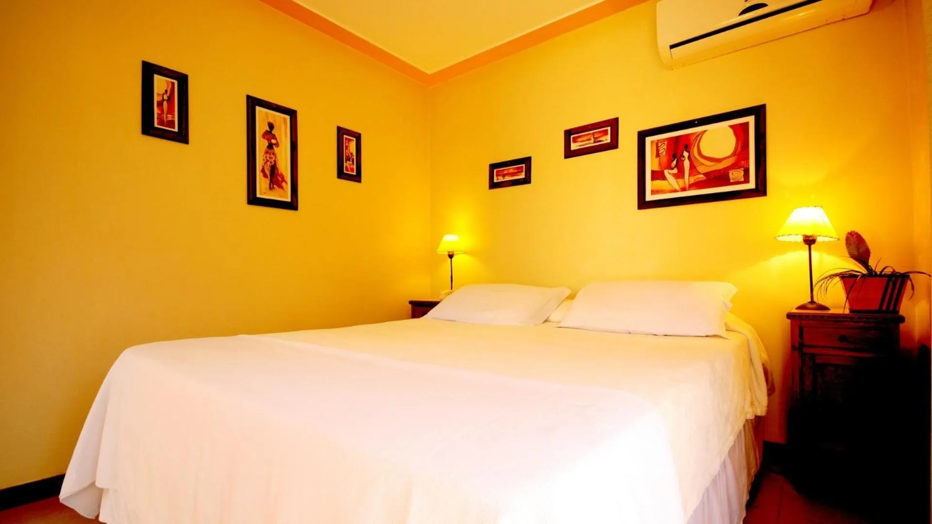 Bed in Pousada El Parador