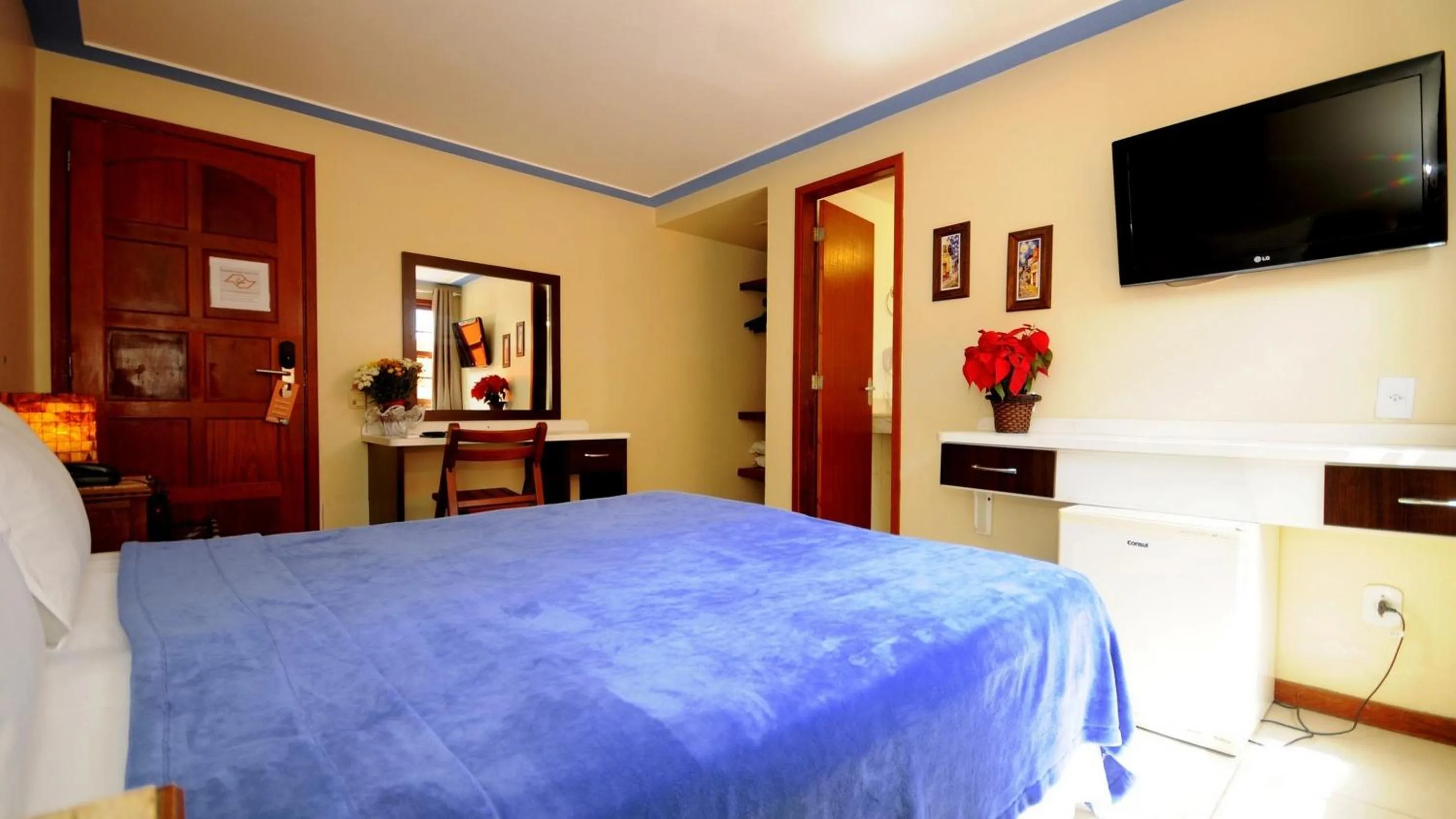 Bed in Pousada El Parador