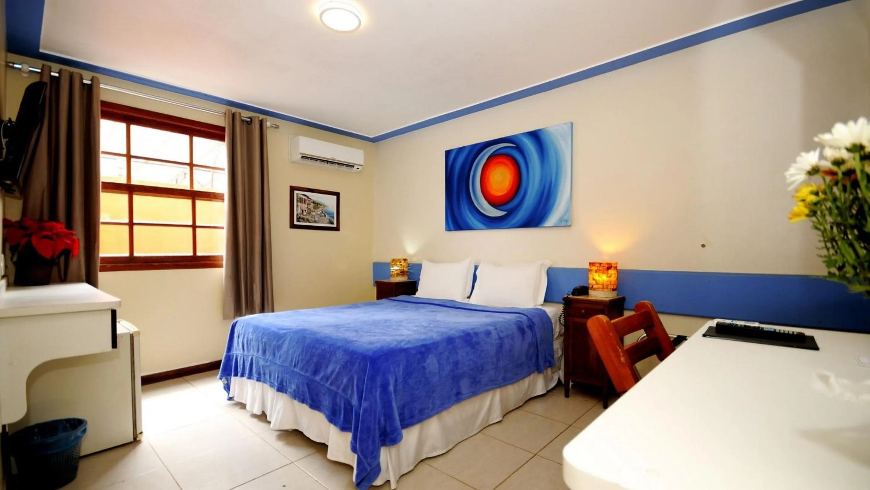 Bed in Pousada El Parador