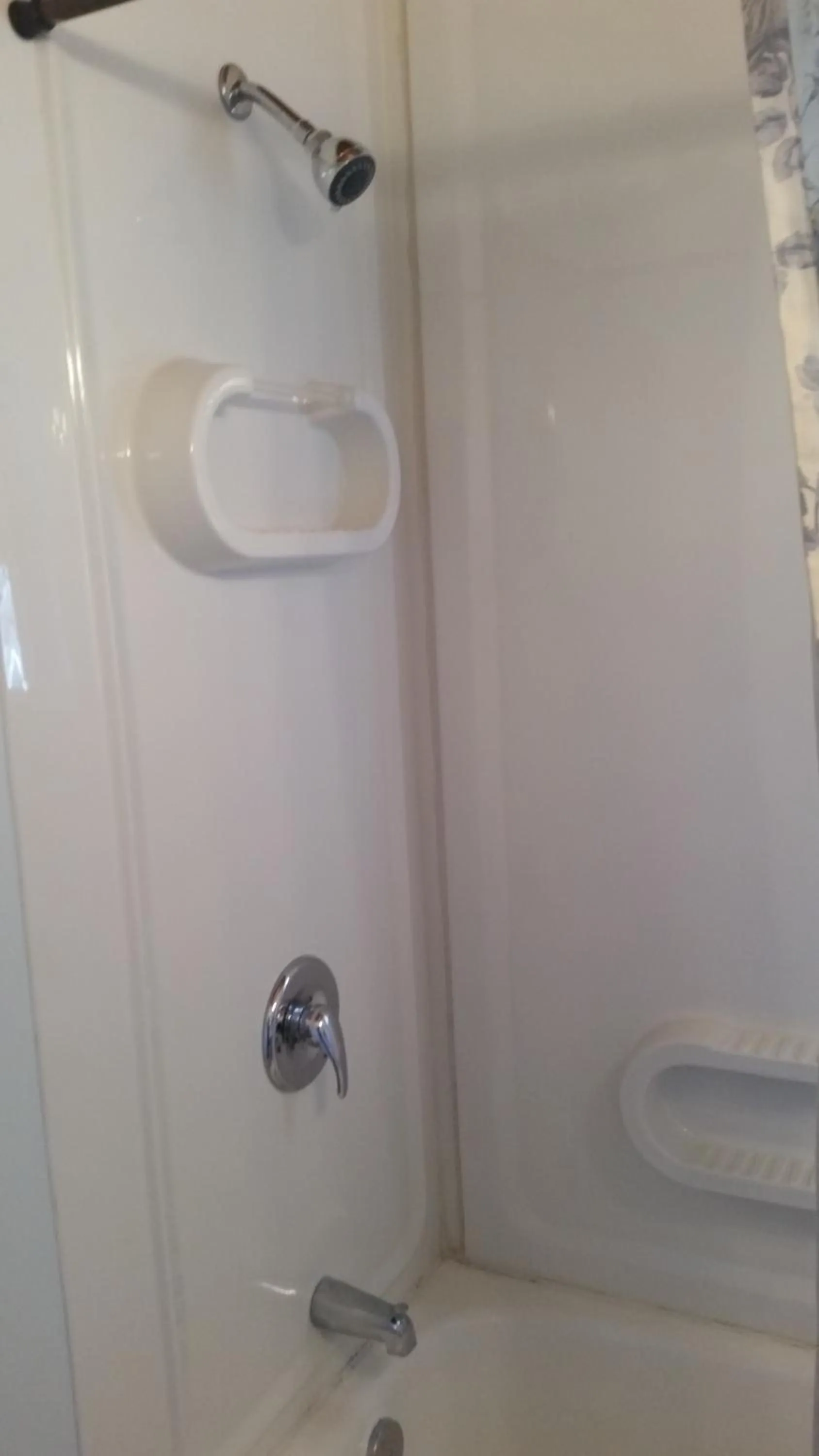 Shower in Holiday House Motel