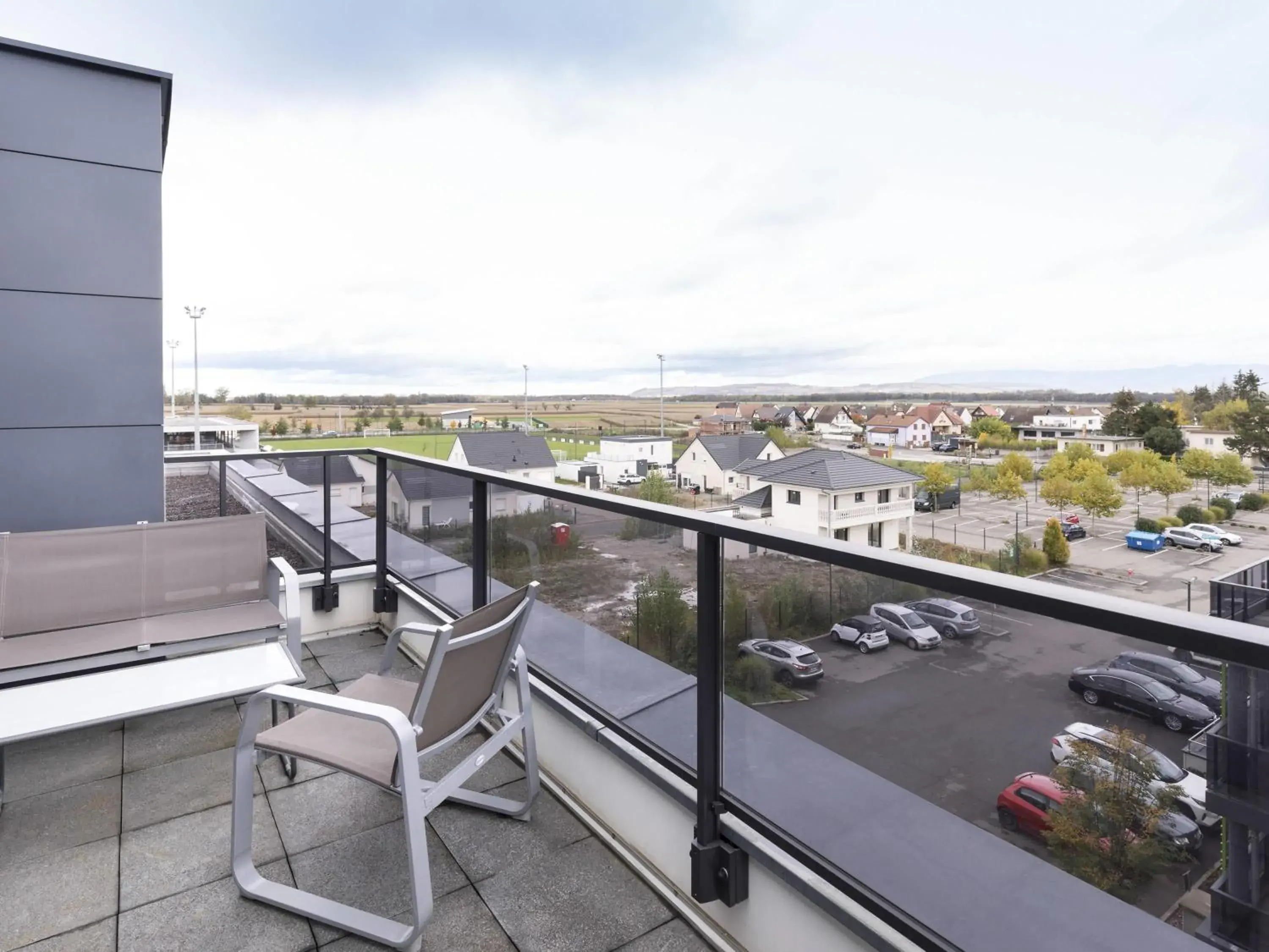 Bedroom in Aparthotel Adagio Bâle Mulhouse Aeroport Bedroom in Aparthotel Adagio Bâle Mulhouse Aeroport