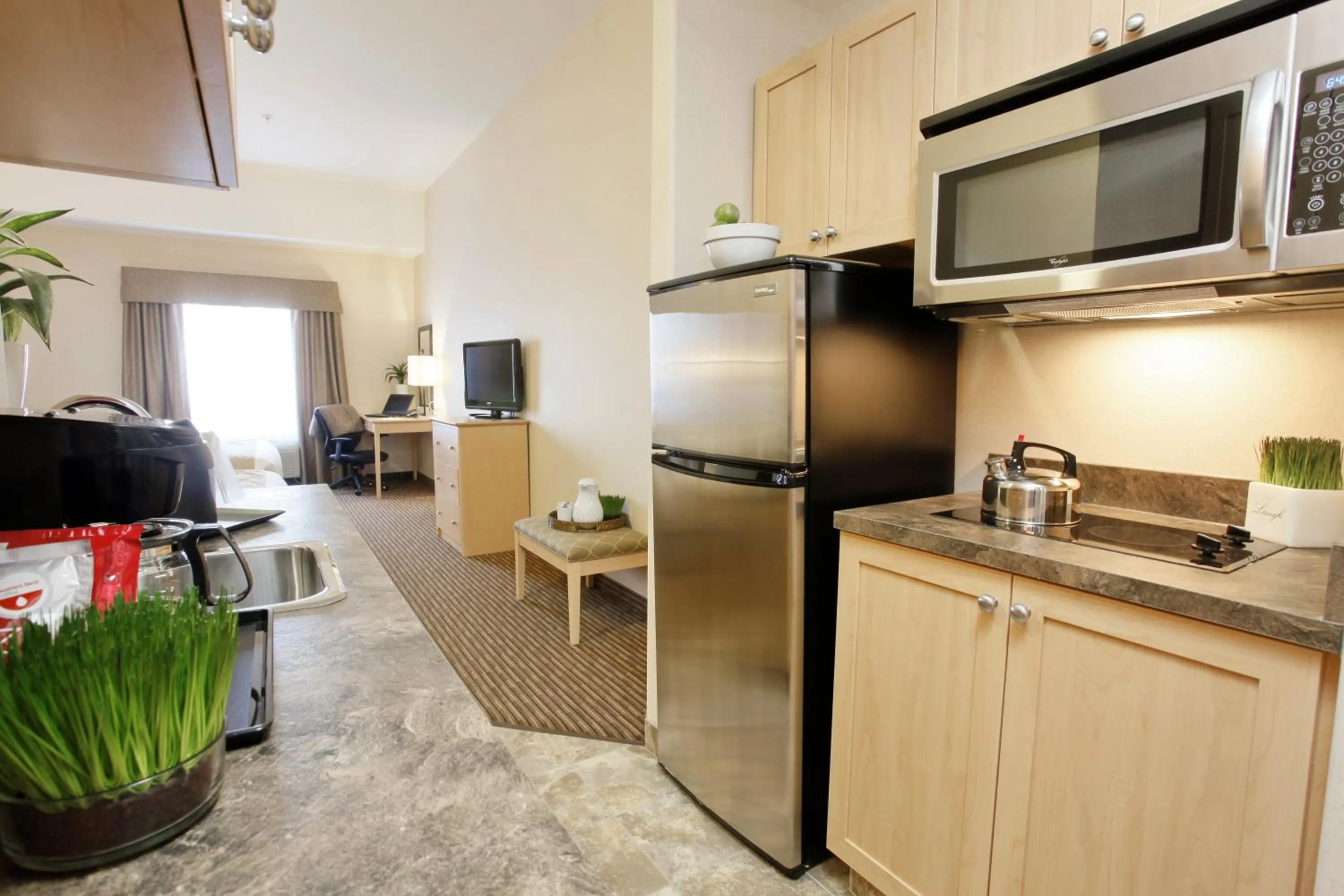 Kitchen or kitchenette in Vegreville Suites
