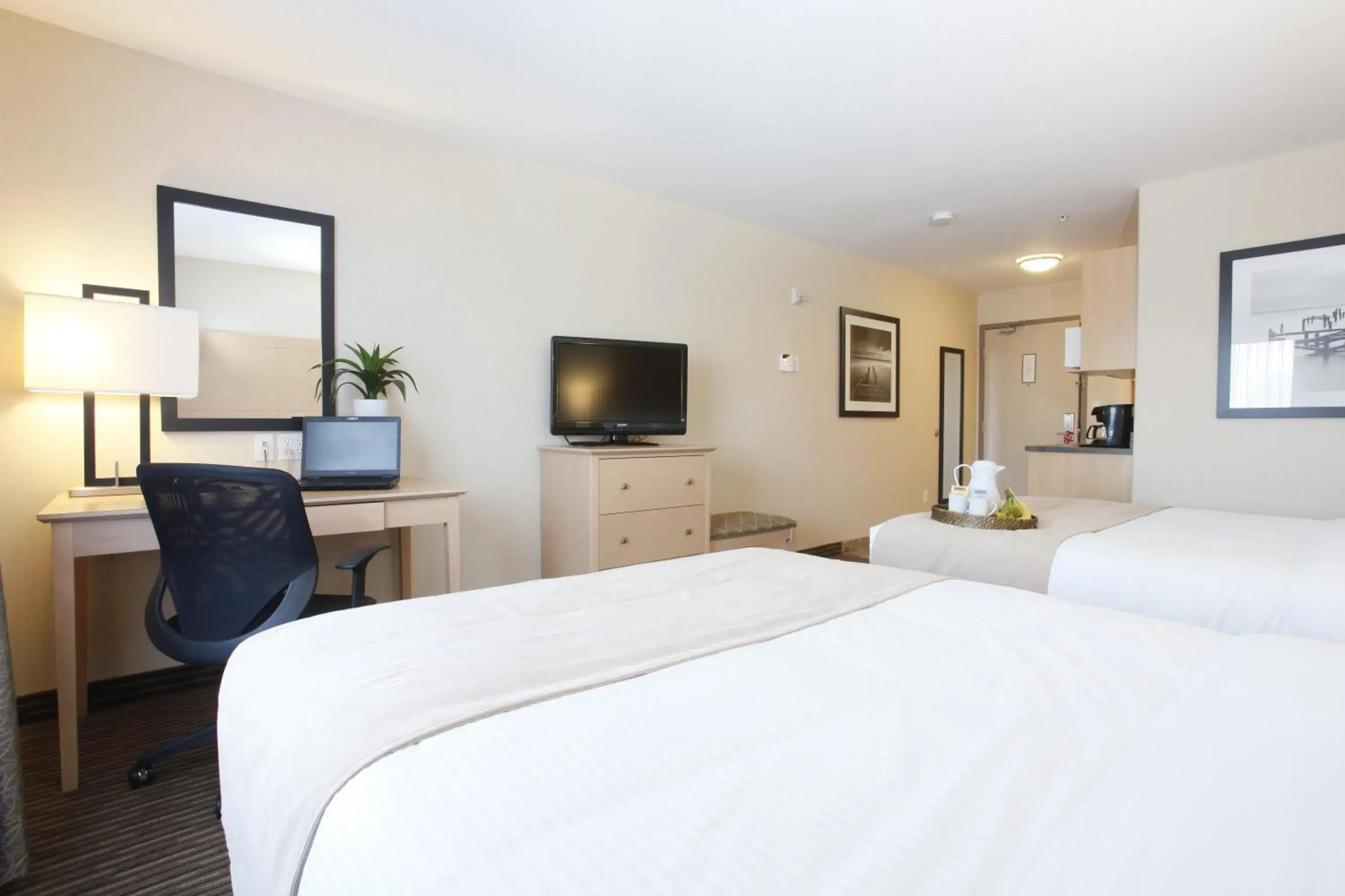 Queen Room with Two Queen Beds in Vegreville Suites Queen Room with Two Queen Beds in Vegreville Suites
