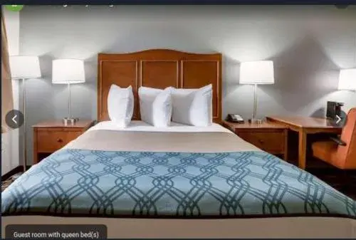 Bedroom, Bed in Travelodge by Wyndham Canton-Livonia Area, MI Bedroom, Bed in Travelodge by Wyndham Canton-Livonia Area, MI