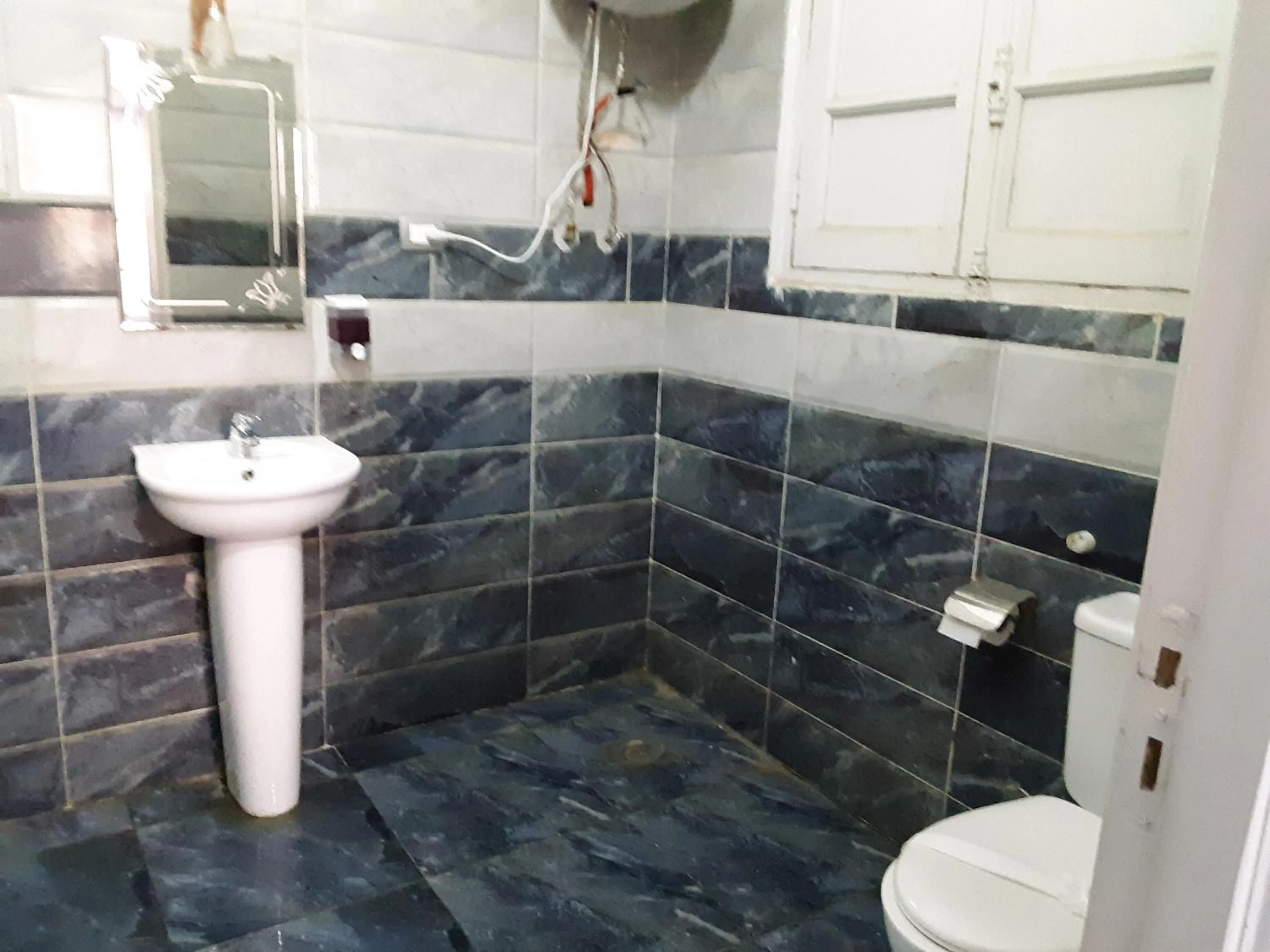 Shower in Hostgram Hotel