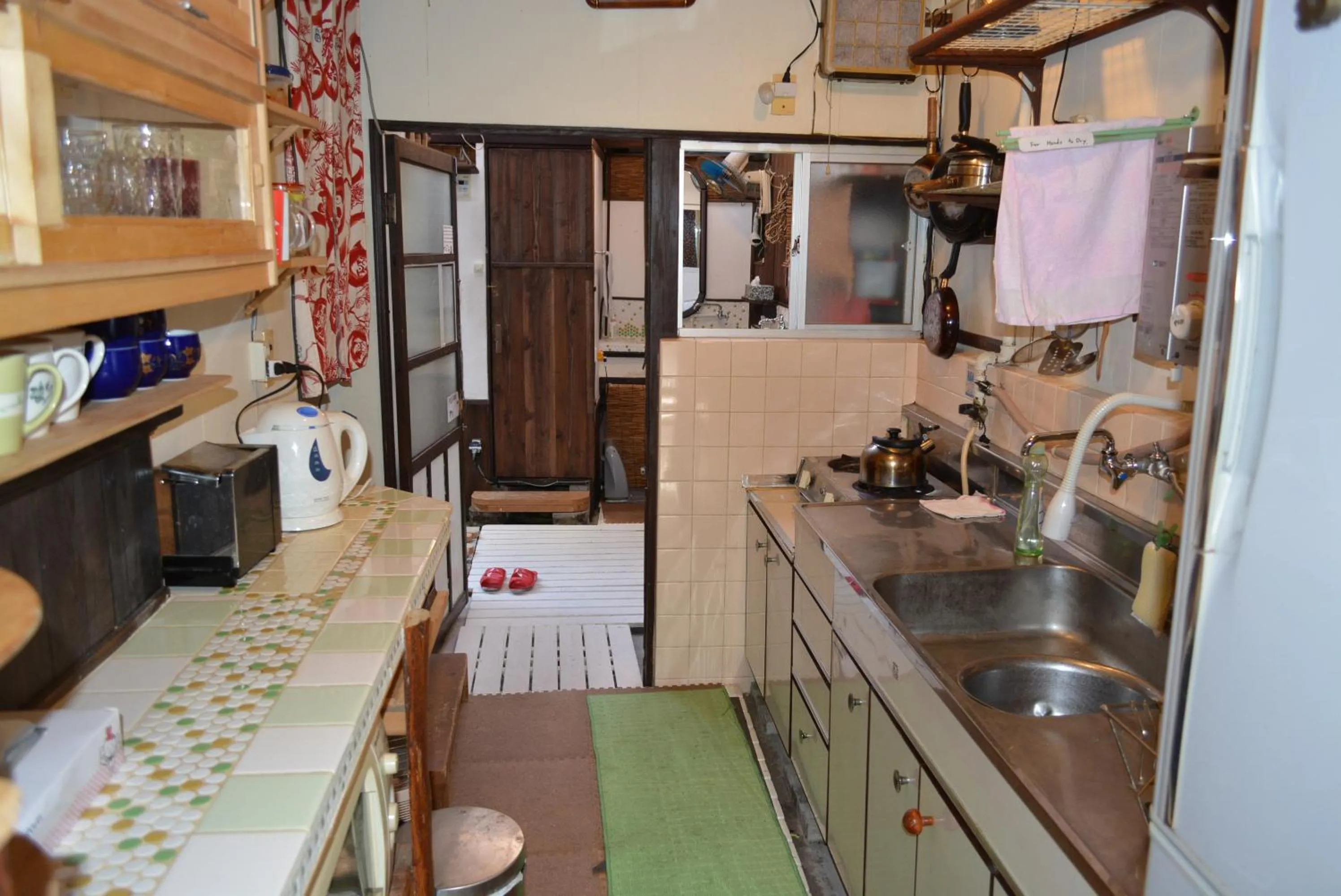 Communal kitchen in Guesthouse Bon