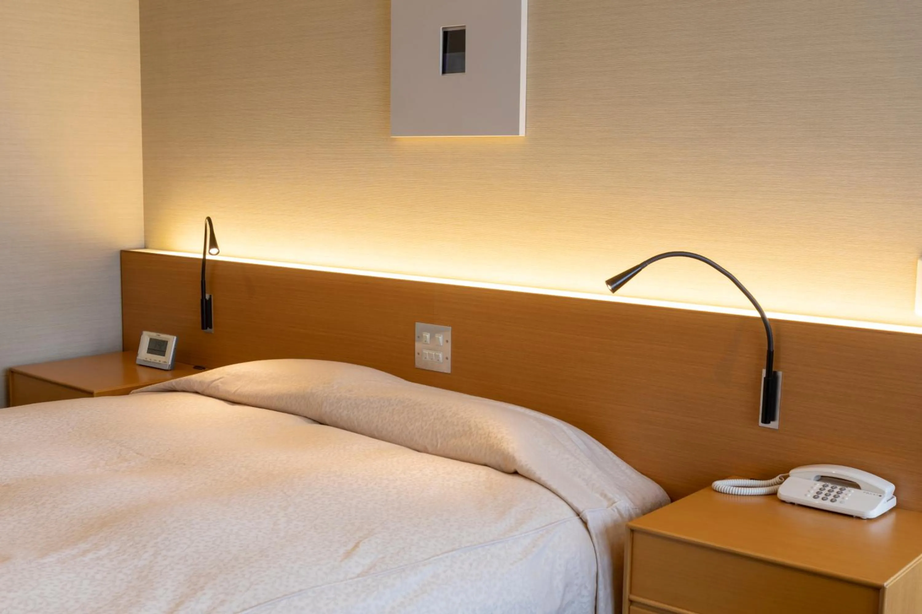 Bed in Hotel Landmark Wakayama