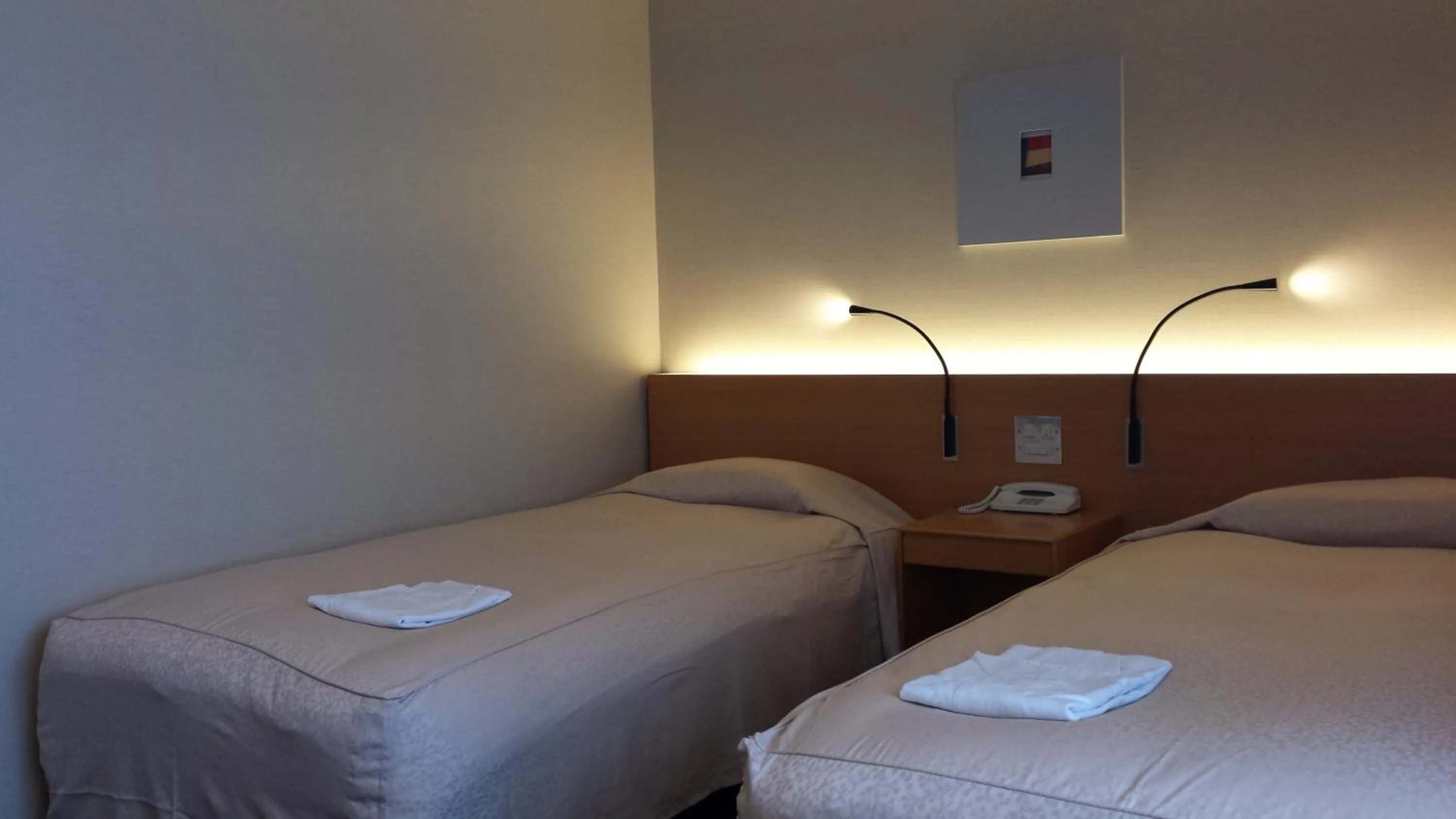 Bed in Hotel Landmark Wakayama