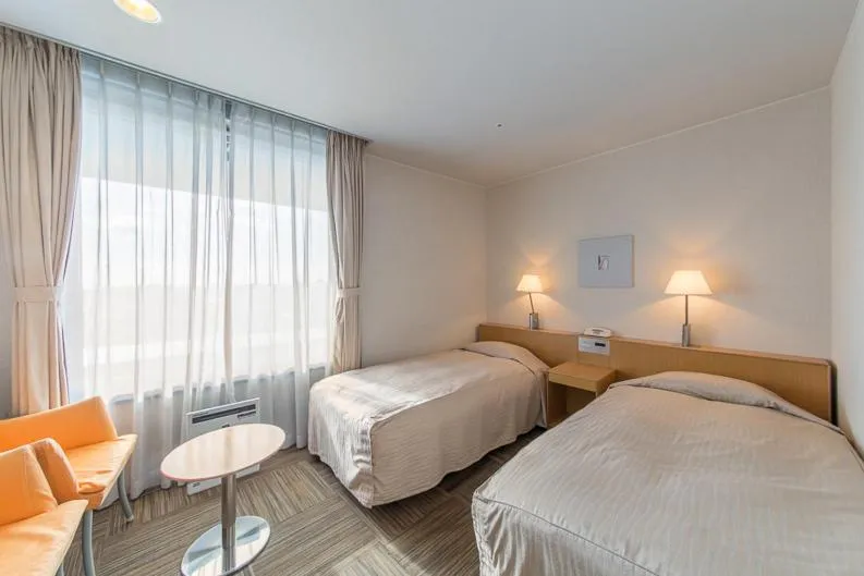 Bed in Hotel Landmark Wakayama