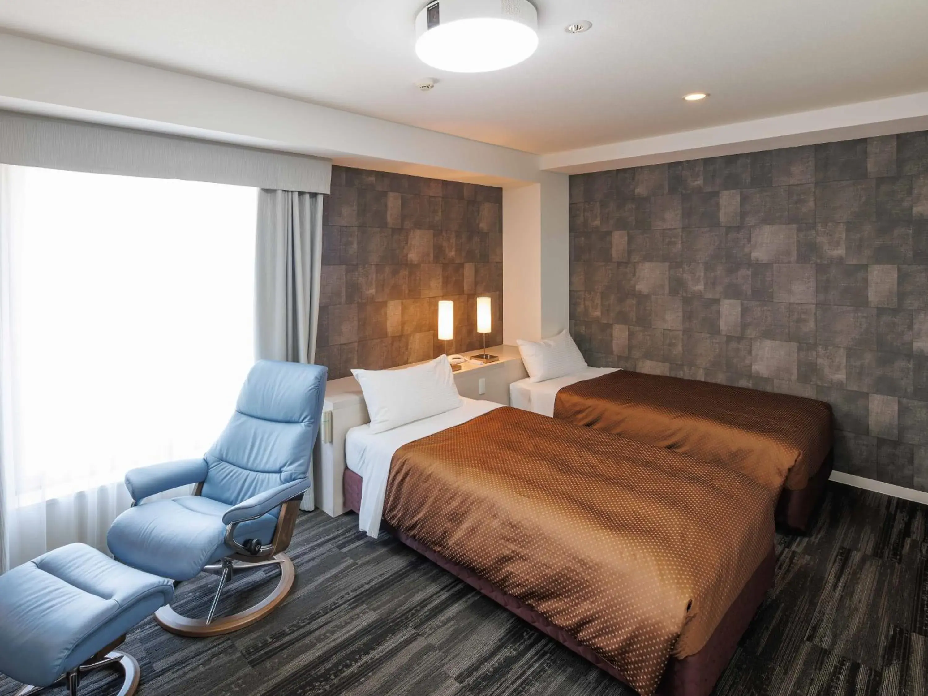 Bed in J Hotel Rinku Bed in J Hotel Rinku