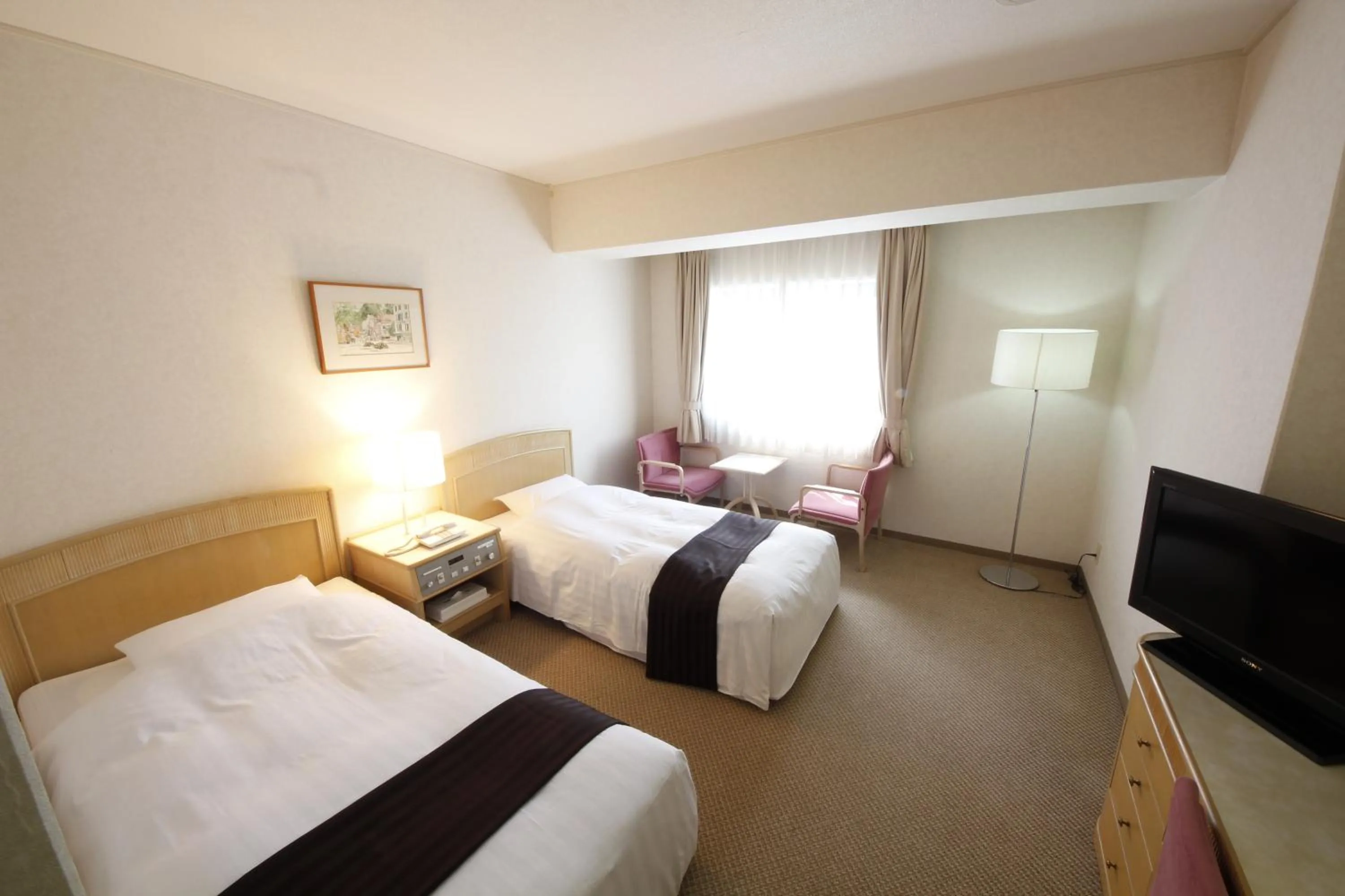 Photo of the whole room, Bed in Hotel Hiroshima Garden Palace