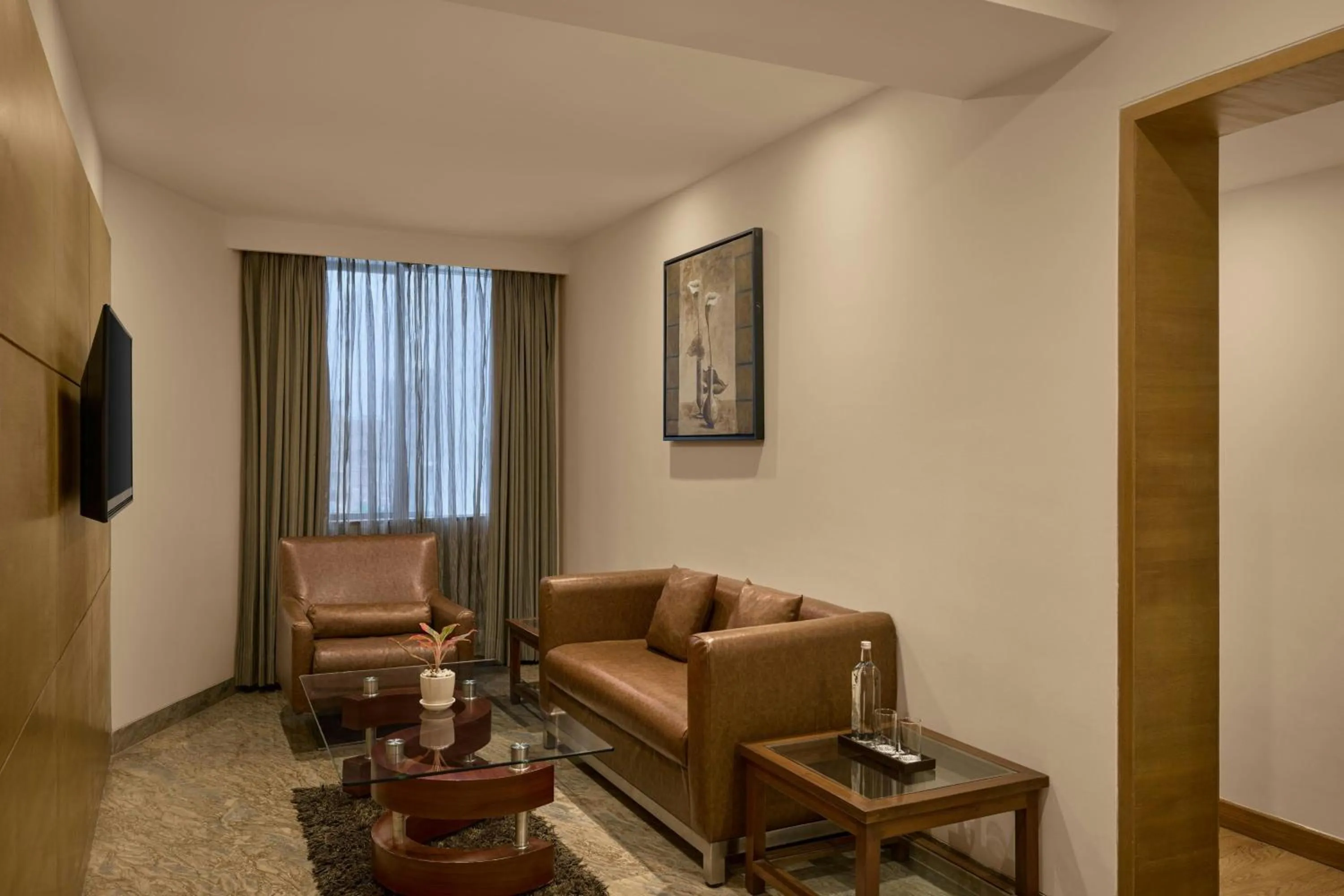Living room in The Fern Residency Ahmedabad, Subhash Bridge, Series by Marriott