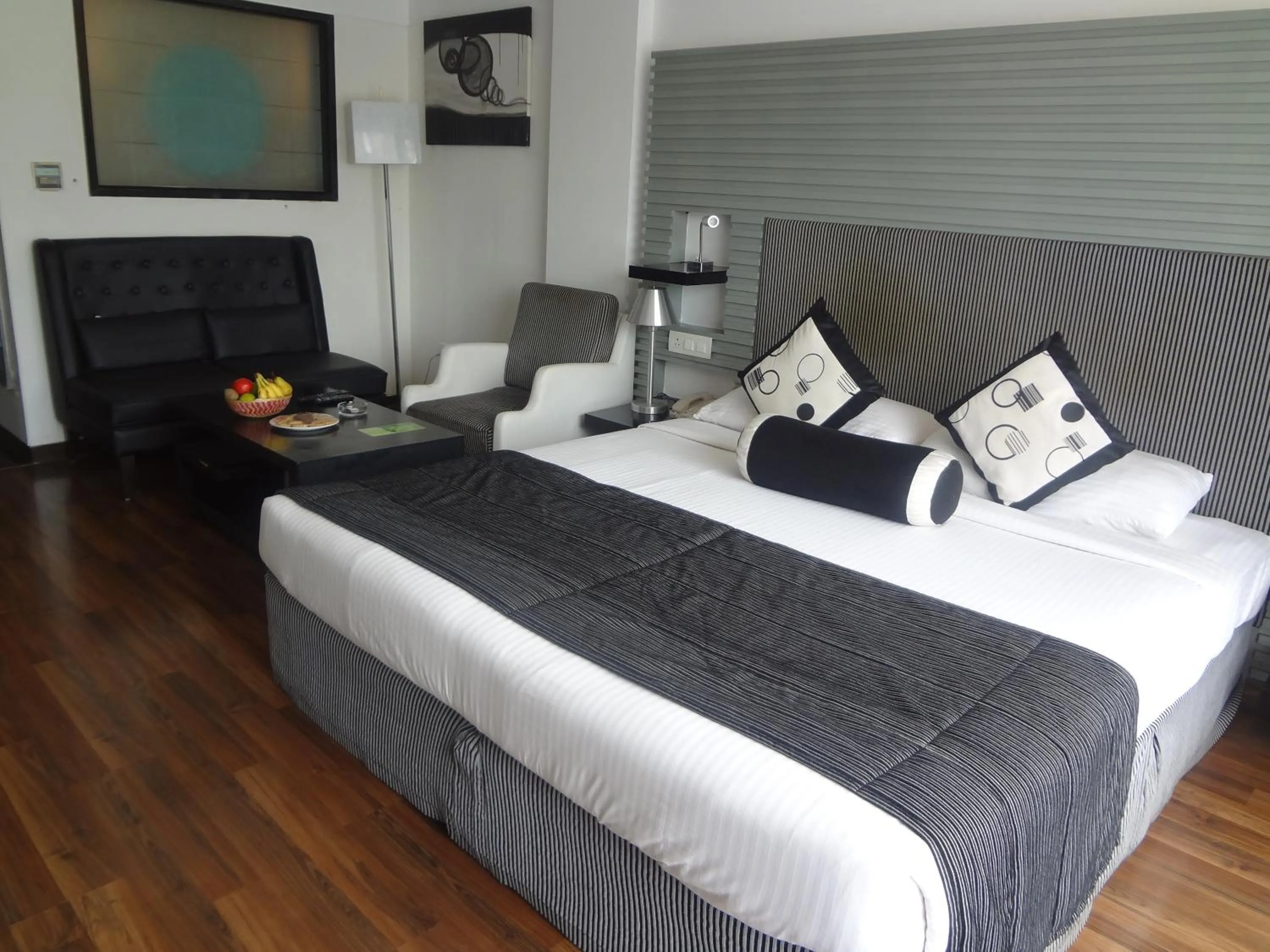 Photo of the whole room, Bed in The Fern Residency, Subhash Bridge, Ahmedabad