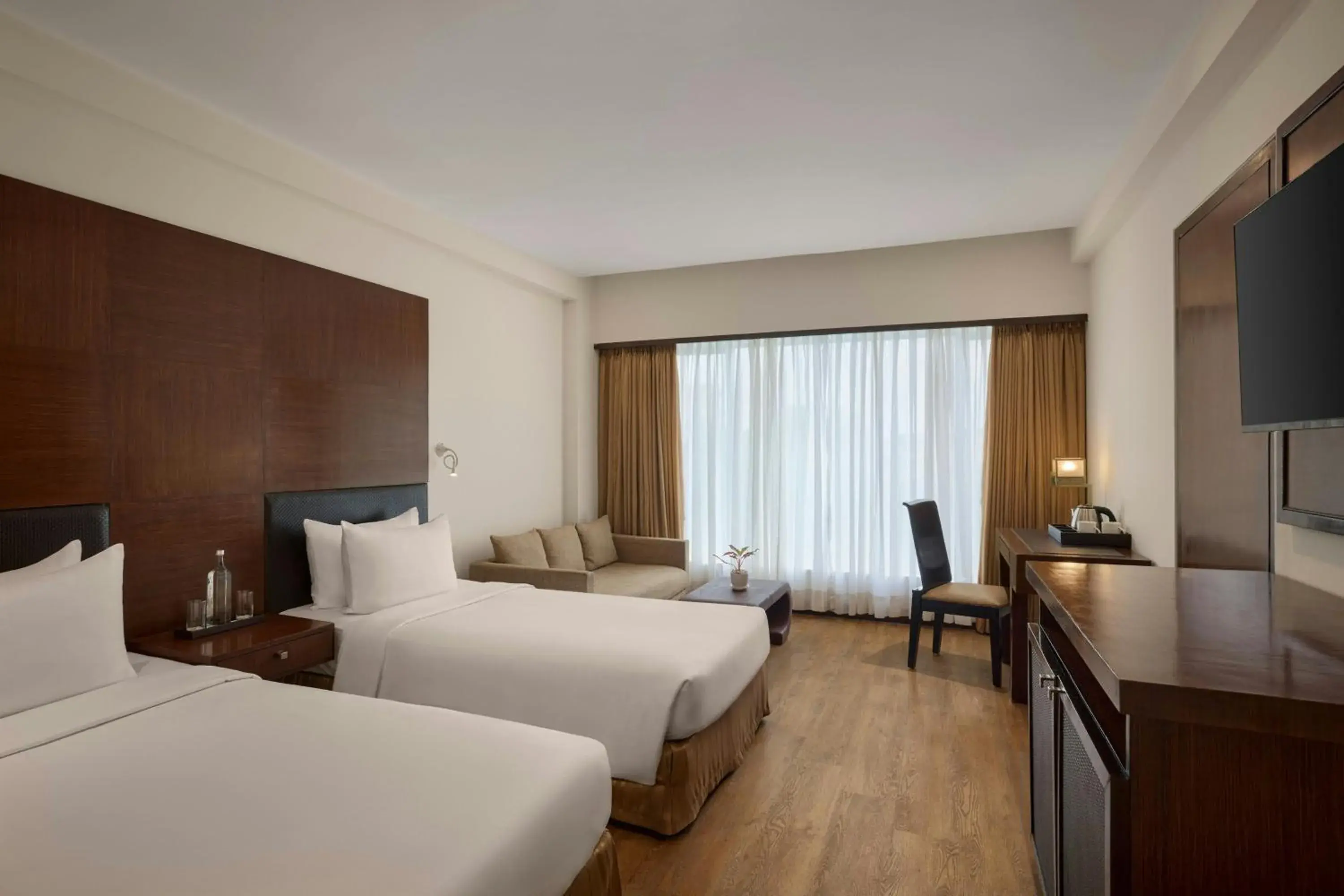 Photo of the whole room, Bed in The Fern Residency Ahmedabad, Subhash Bridge, Series by Marriott Photo of the whole room, Bed in The Fern Residency Ahmedabad, Subhash Bridge, Series by Marriott