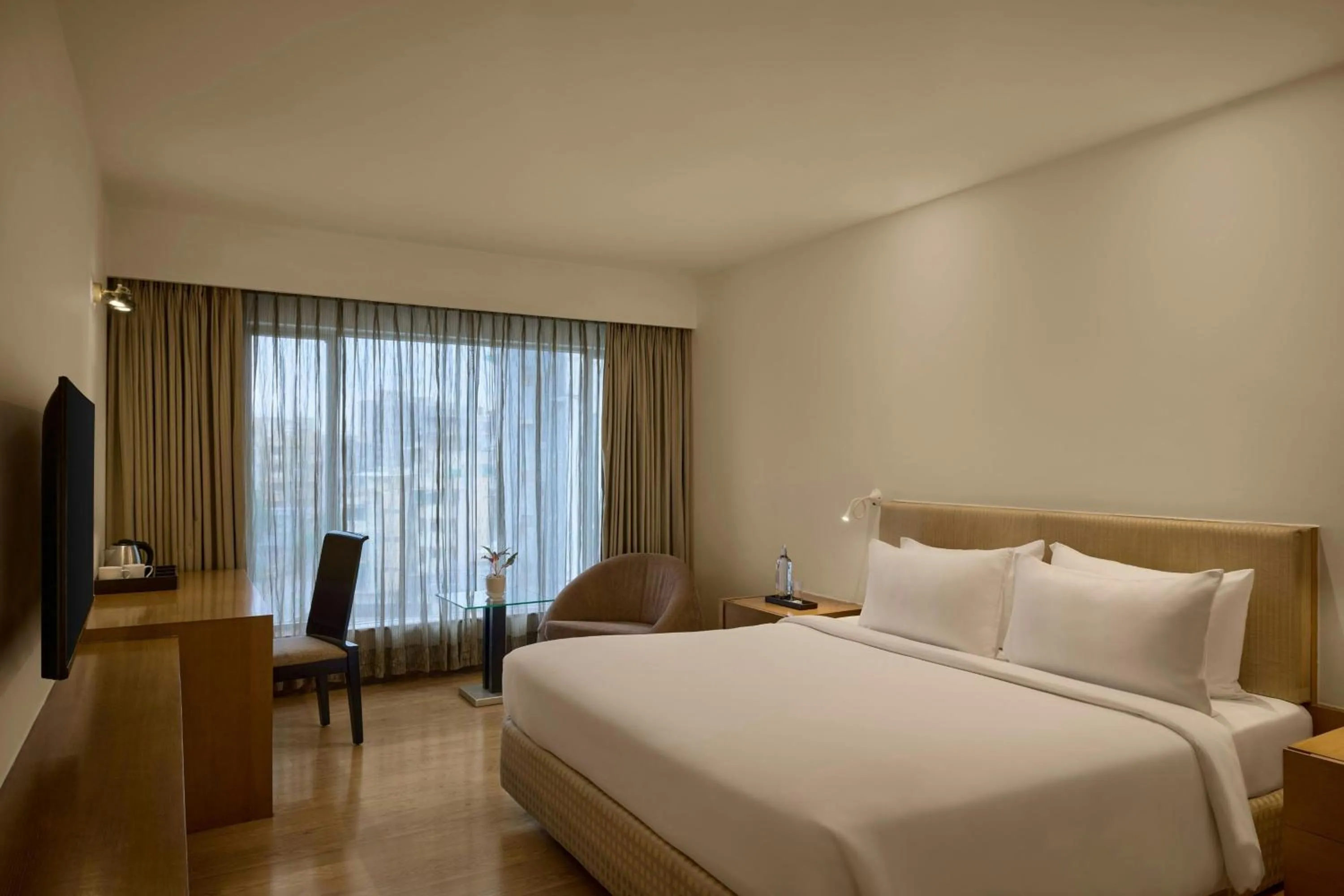 Photo of the whole room, Bed in The Fern Residency Ahmedabad, Subhash Bridge, Series by Marriott