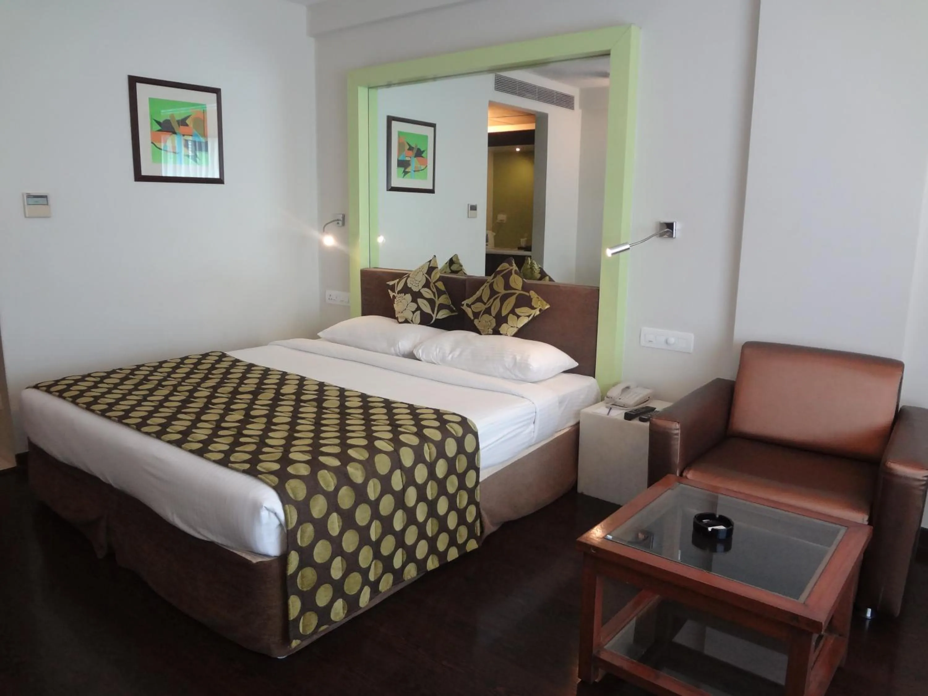 Photo of the whole room, Bed in The Fern Residency, Subhash Bridge, Ahmedabad