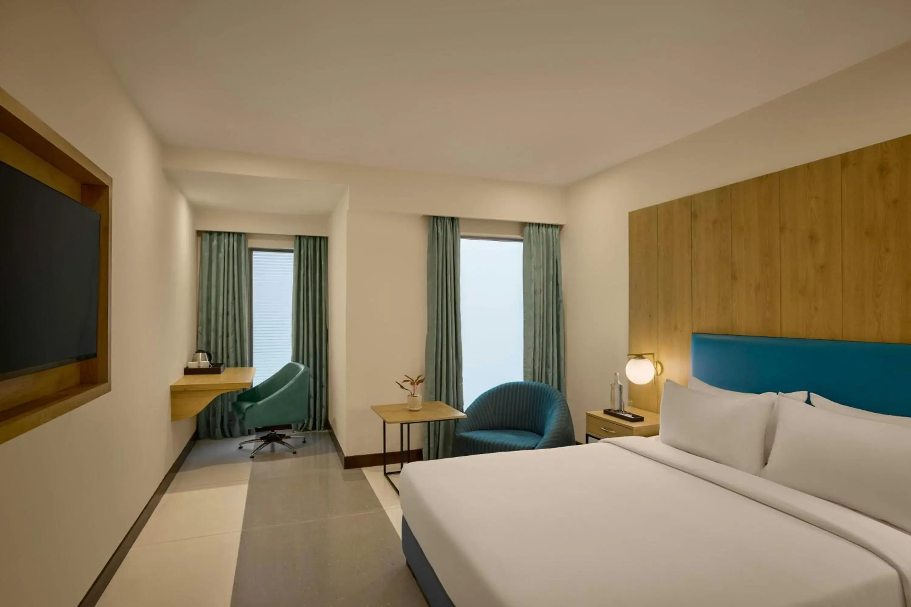 Photo of the whole room, Bed in The Fern Residency Ahmedabad, Subhash Bridge, Series by Marriott Photo of the whole room, Bed in The Fern Residency Ahmedabad, Subhash Bridge, Series by Marriott