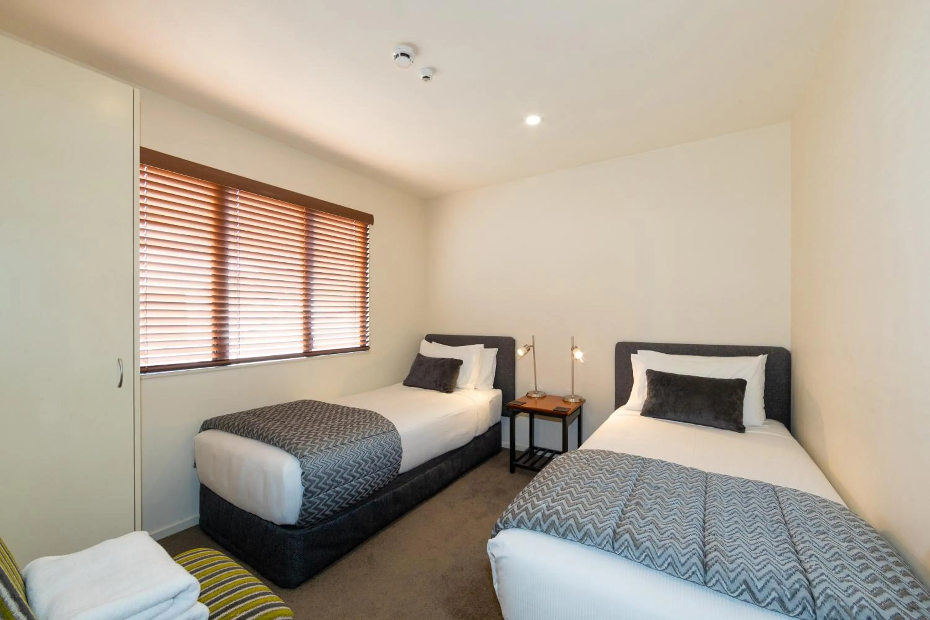 Bedroom, Bed in Harvest Lodge Motel