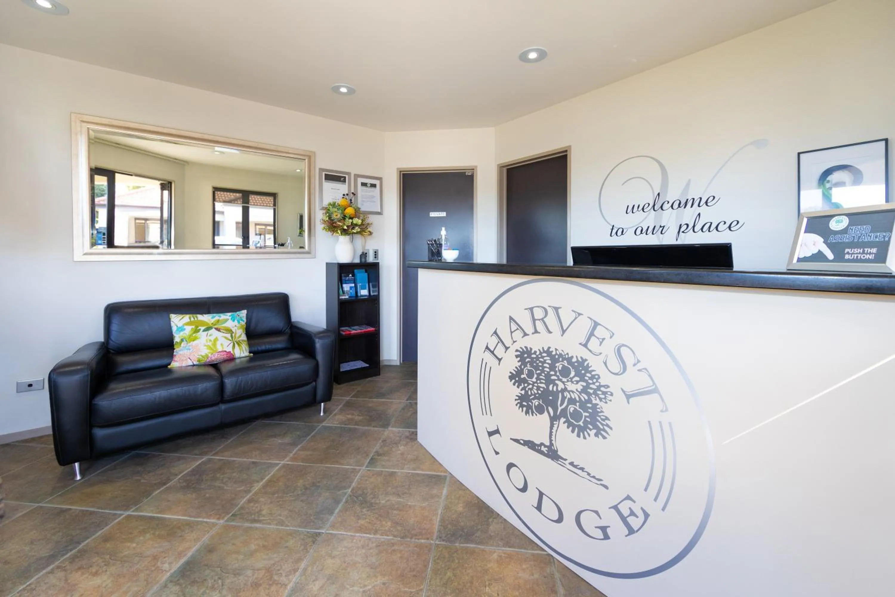 Property logo or sign in Harvest Lodge Motel