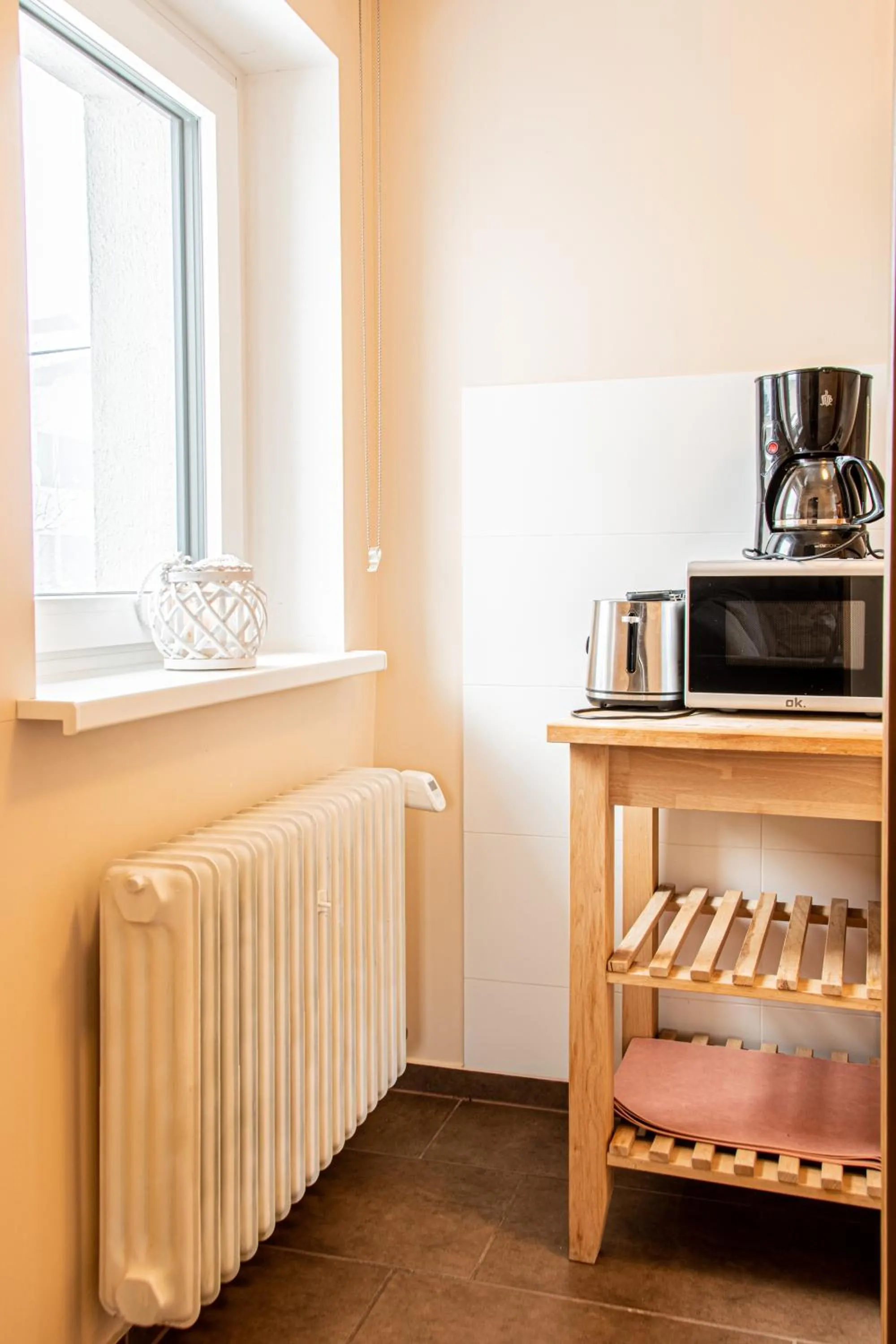 Kitchen or kitchenette, Bed in Bergzeit Appartments