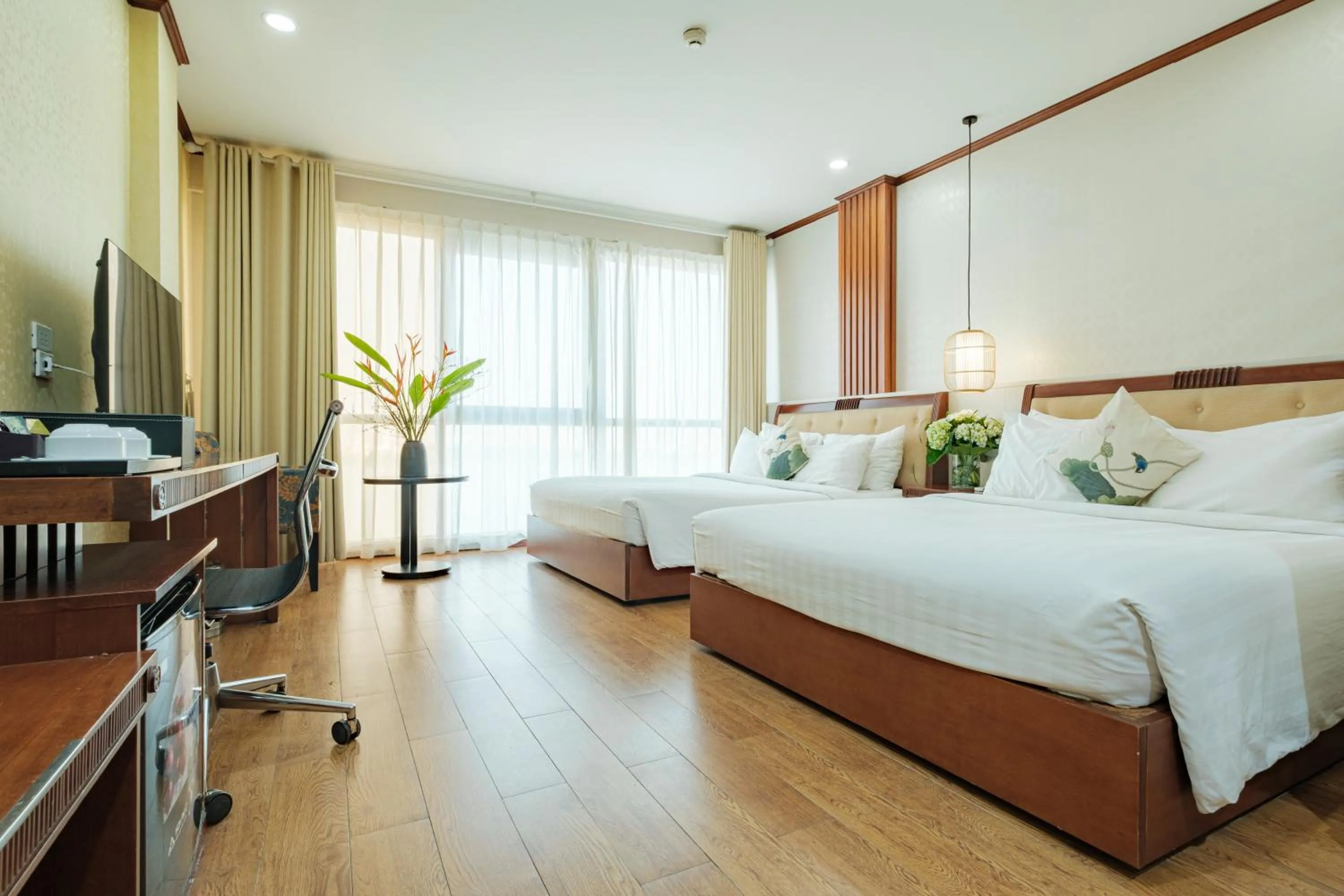 Bed in Sunset Westlake Hanoi Hotel