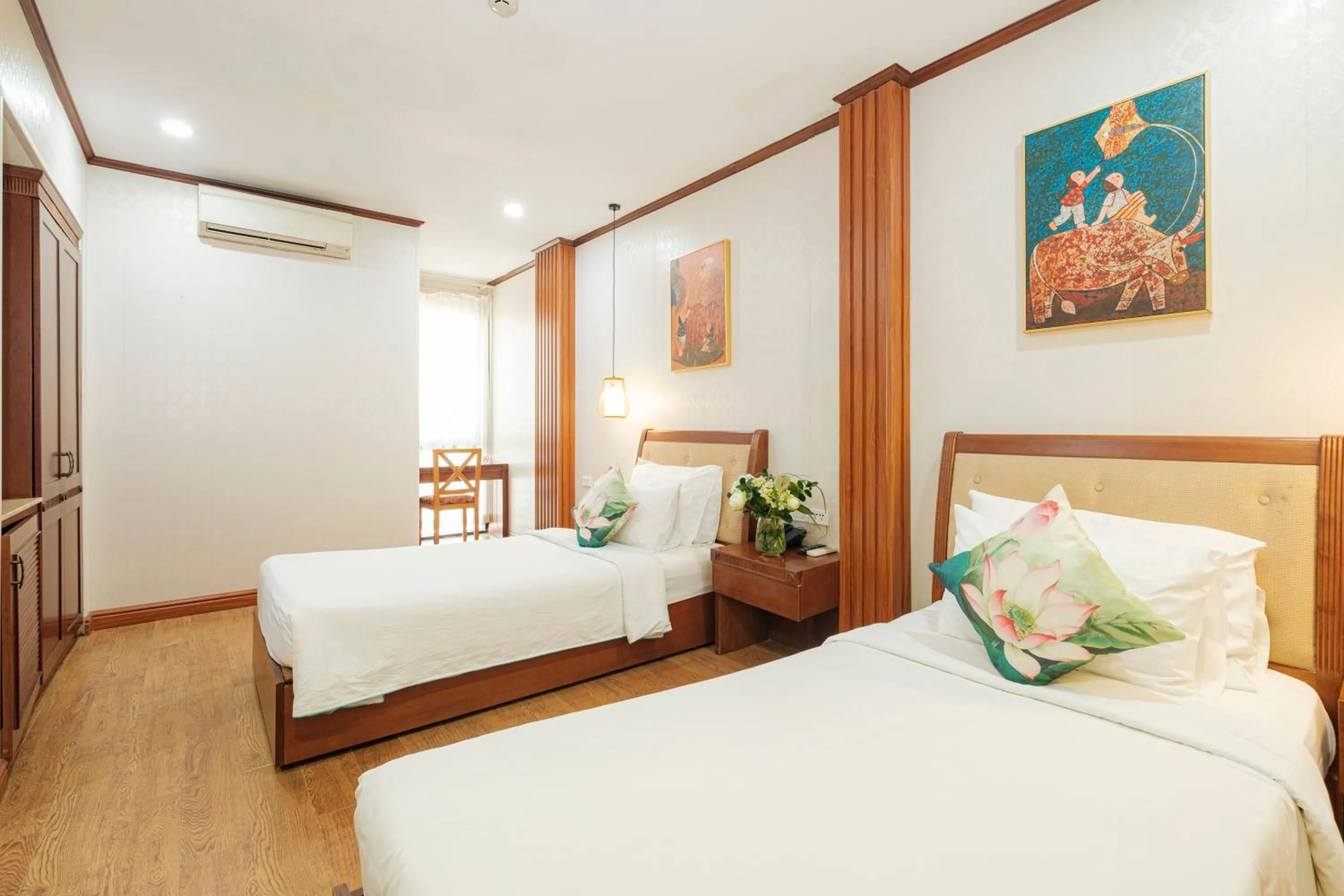 Bed in Sunset Westlake Hanoi Hotel