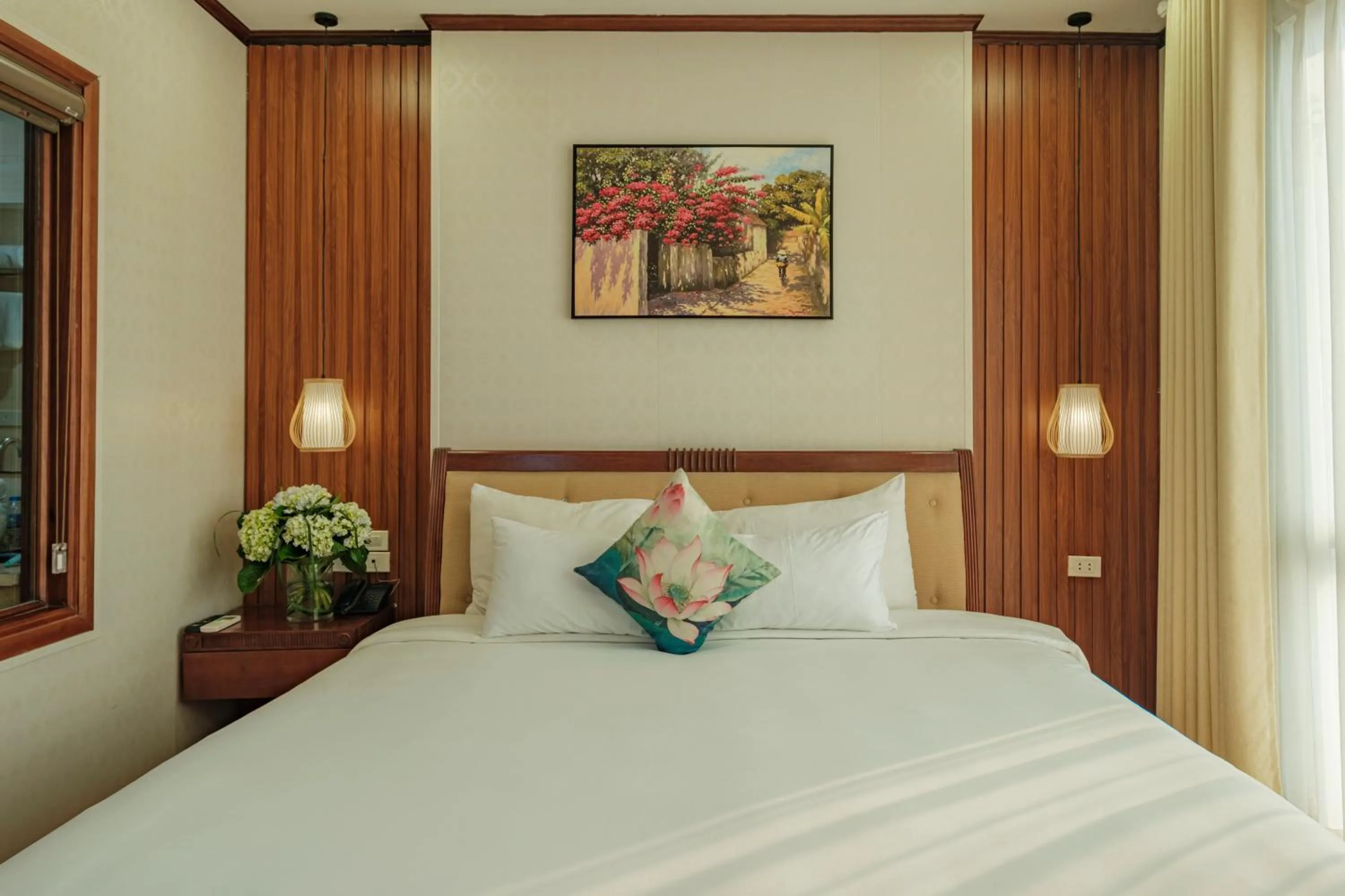 Bed in Sunset Westlake Hanoi Hotel