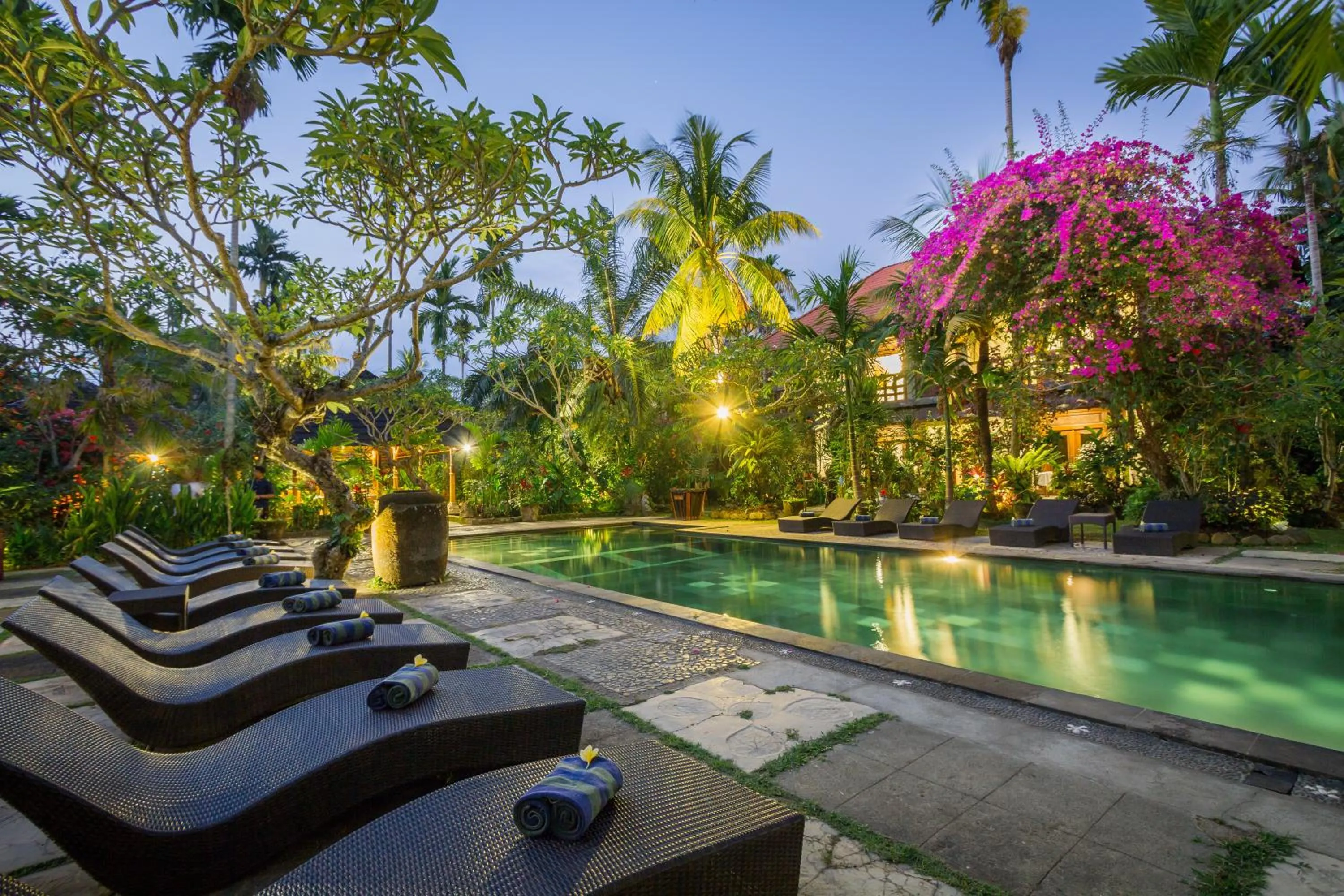 Swimming pool in Ubud Inn Cottage by Prasi