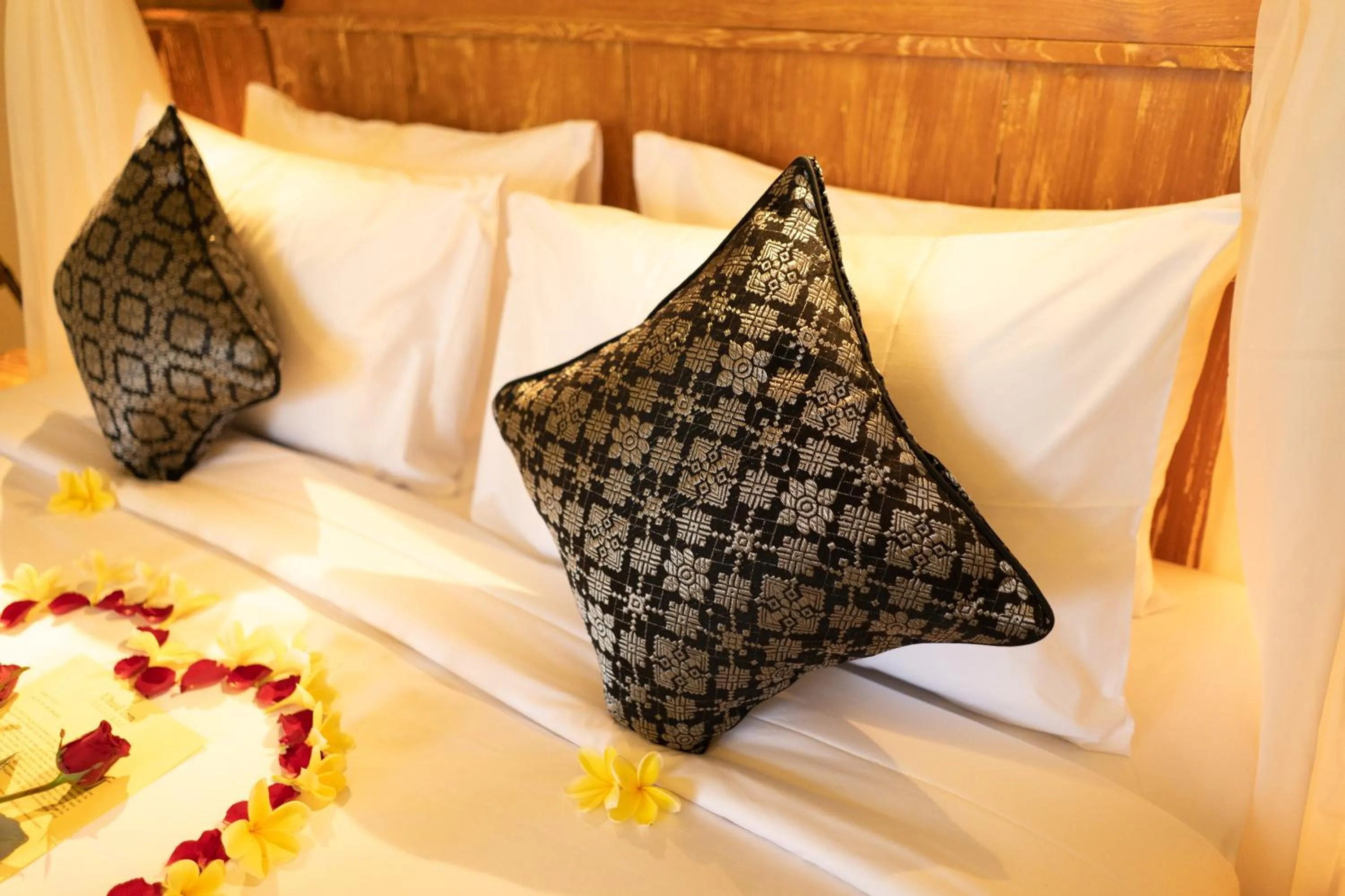 Bed in Ubud Inn Cottage by Prasi