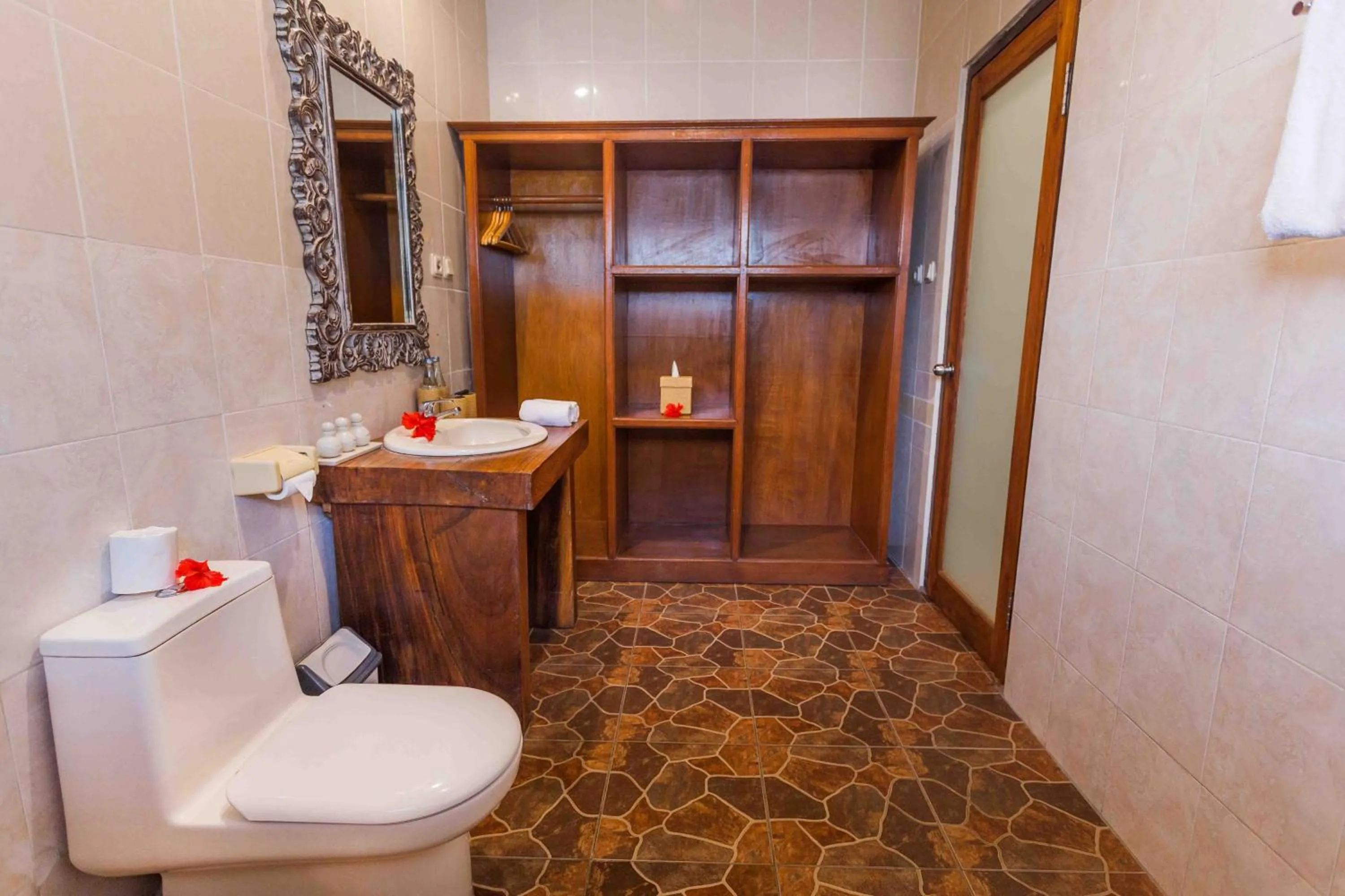Bathroom in Ubud Inn Cottage by Prasi