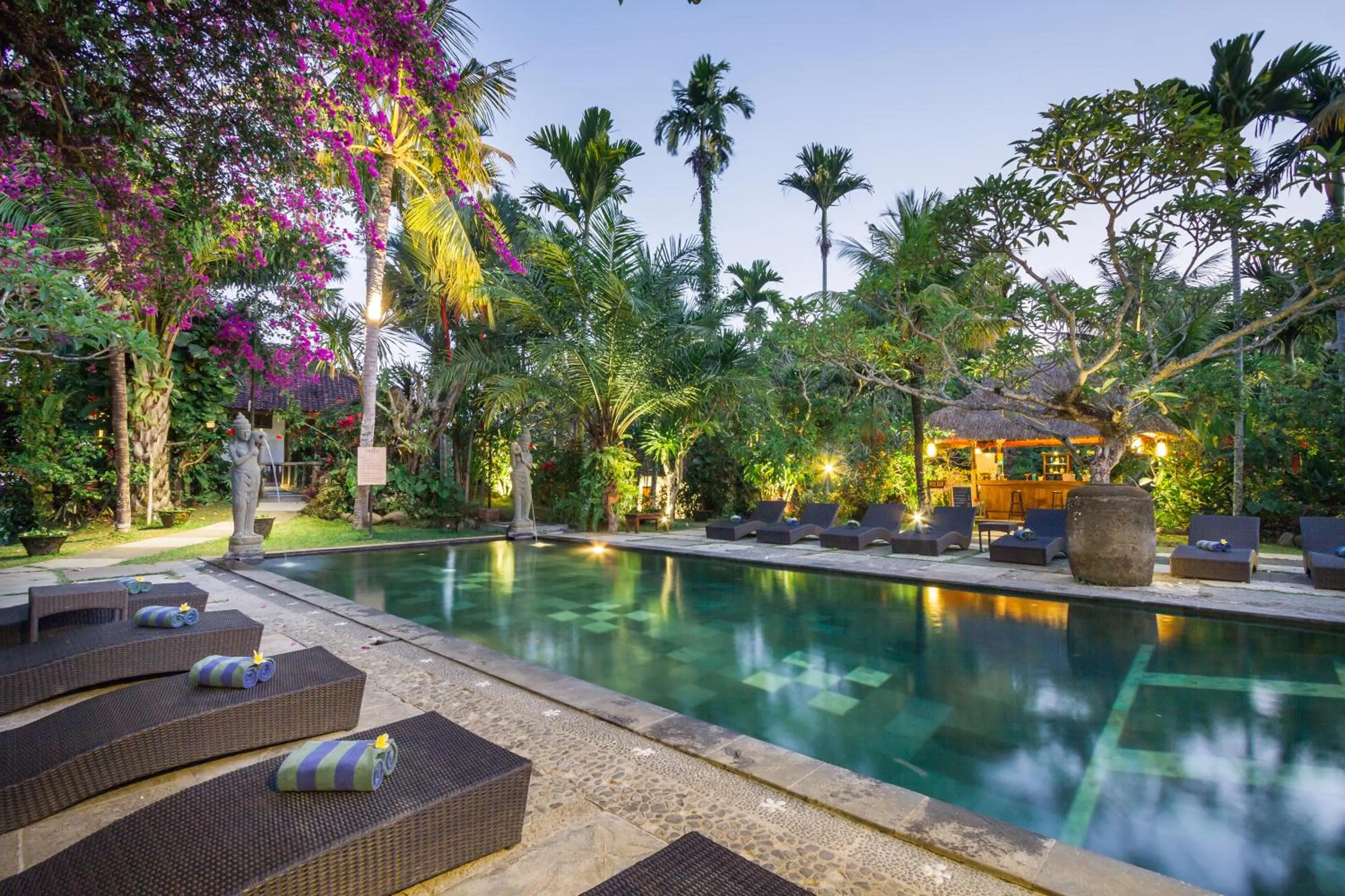 Swimming pool in Ubud Inn Cottage by Prasi