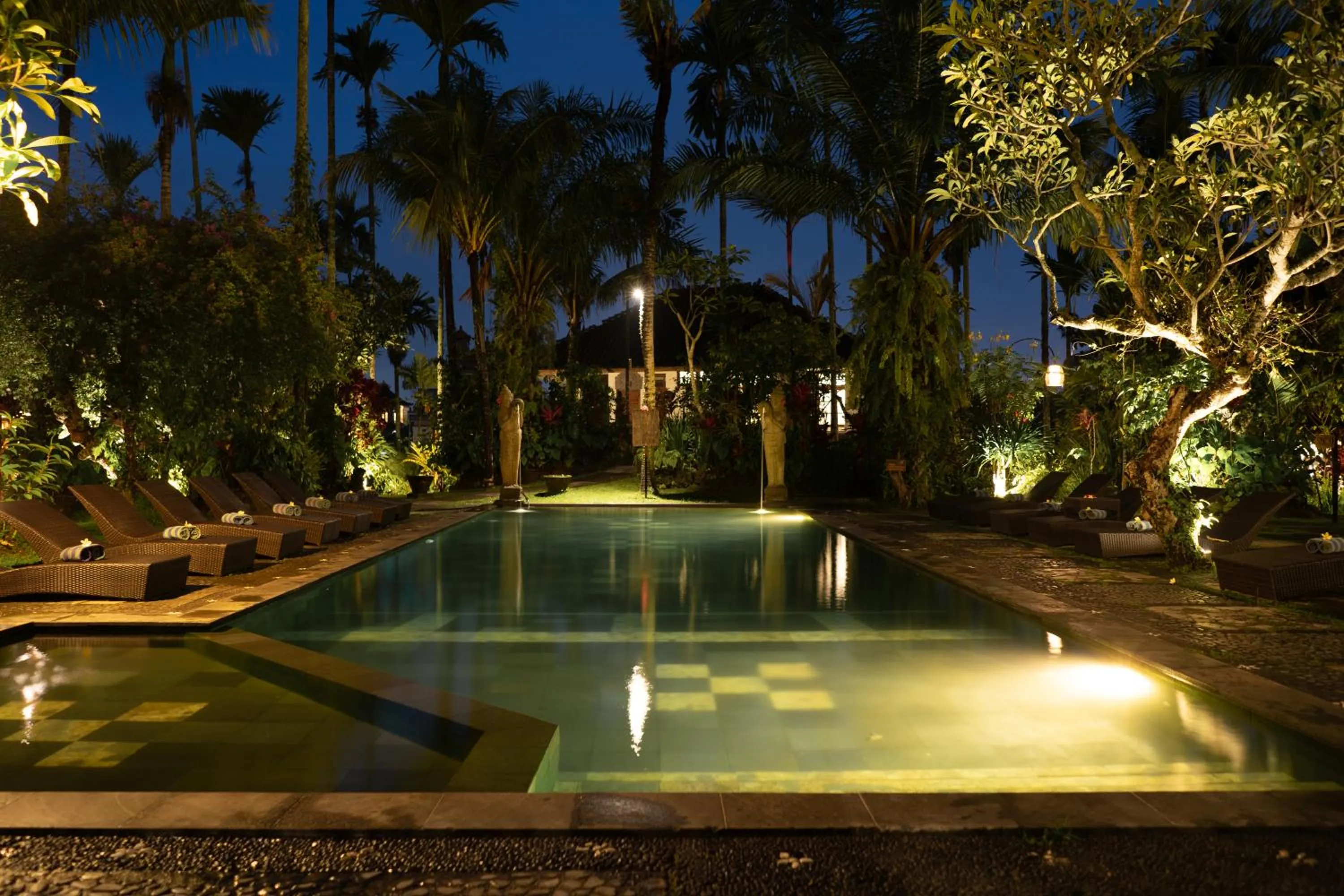 Swimming pool in Ubud Inn Cottage by Prasi