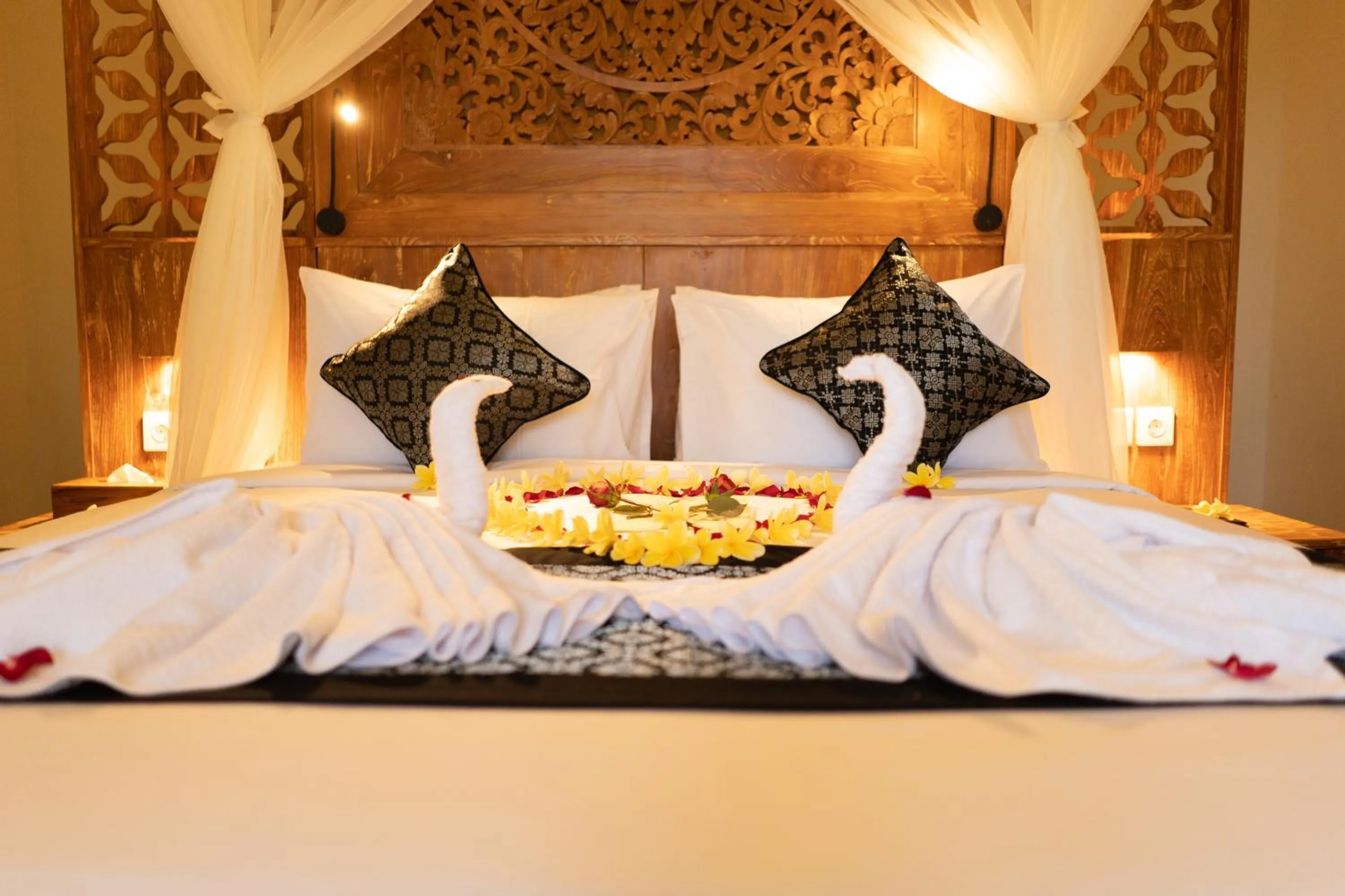 Bed in Ubud Inn Cottage by Prasi