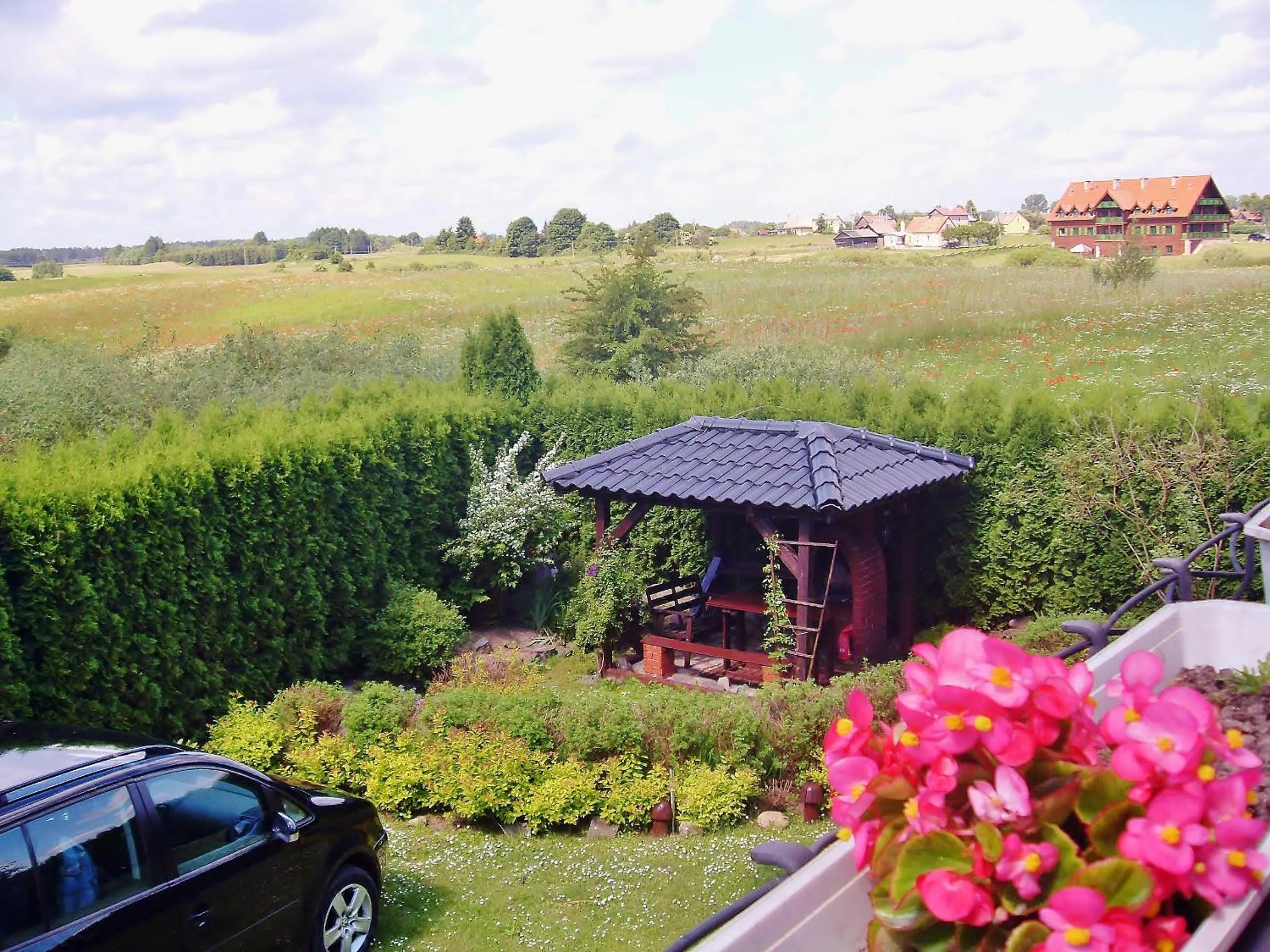 Balcony/Terrace in Willa Cyklada, grill, śniadania, jezioro,przystań,tawerna-200m, park linowy-400m, centrum,aquapark-900m