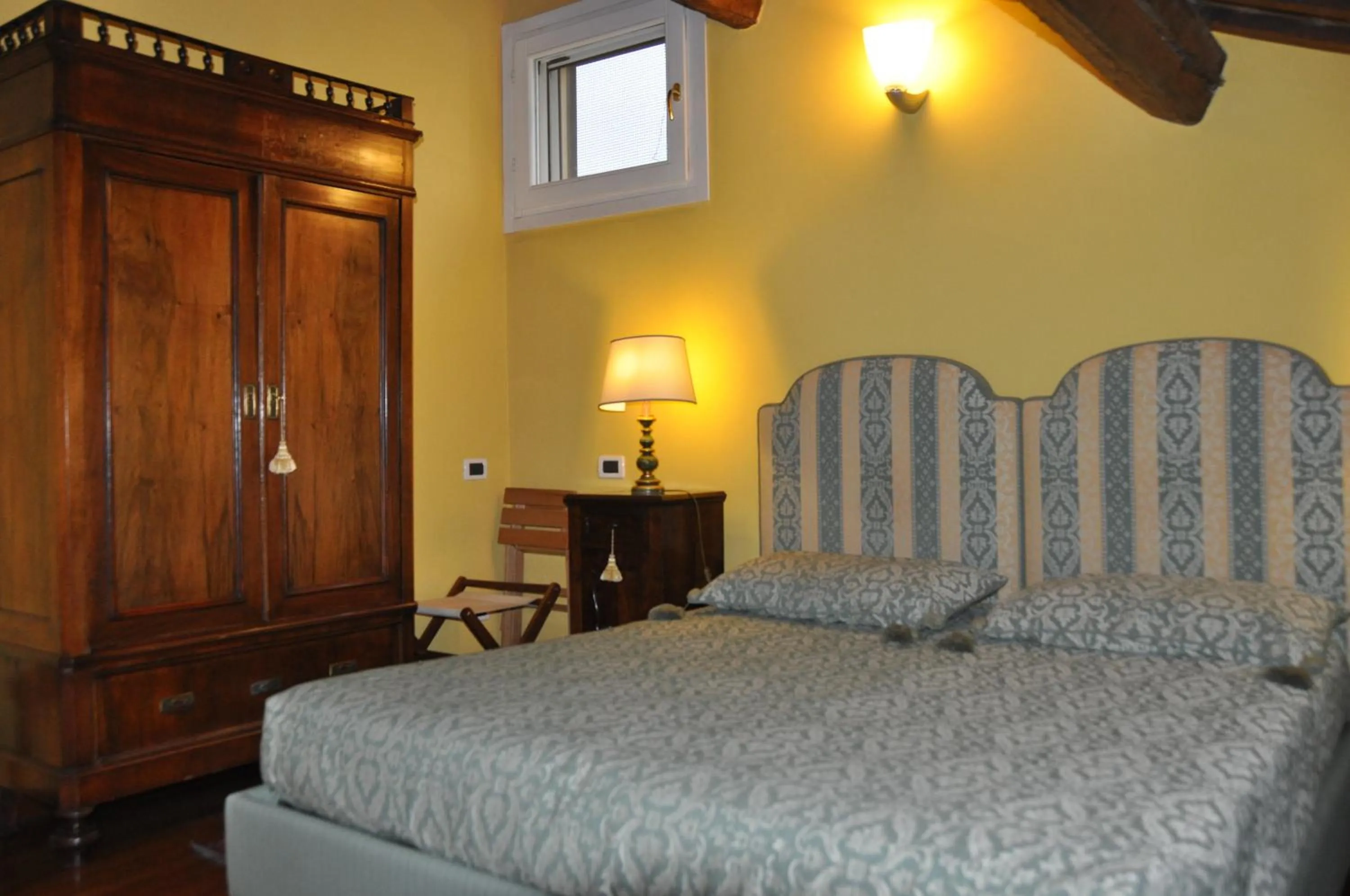 Decorative detail, Bed in Piazza Nova Guest House