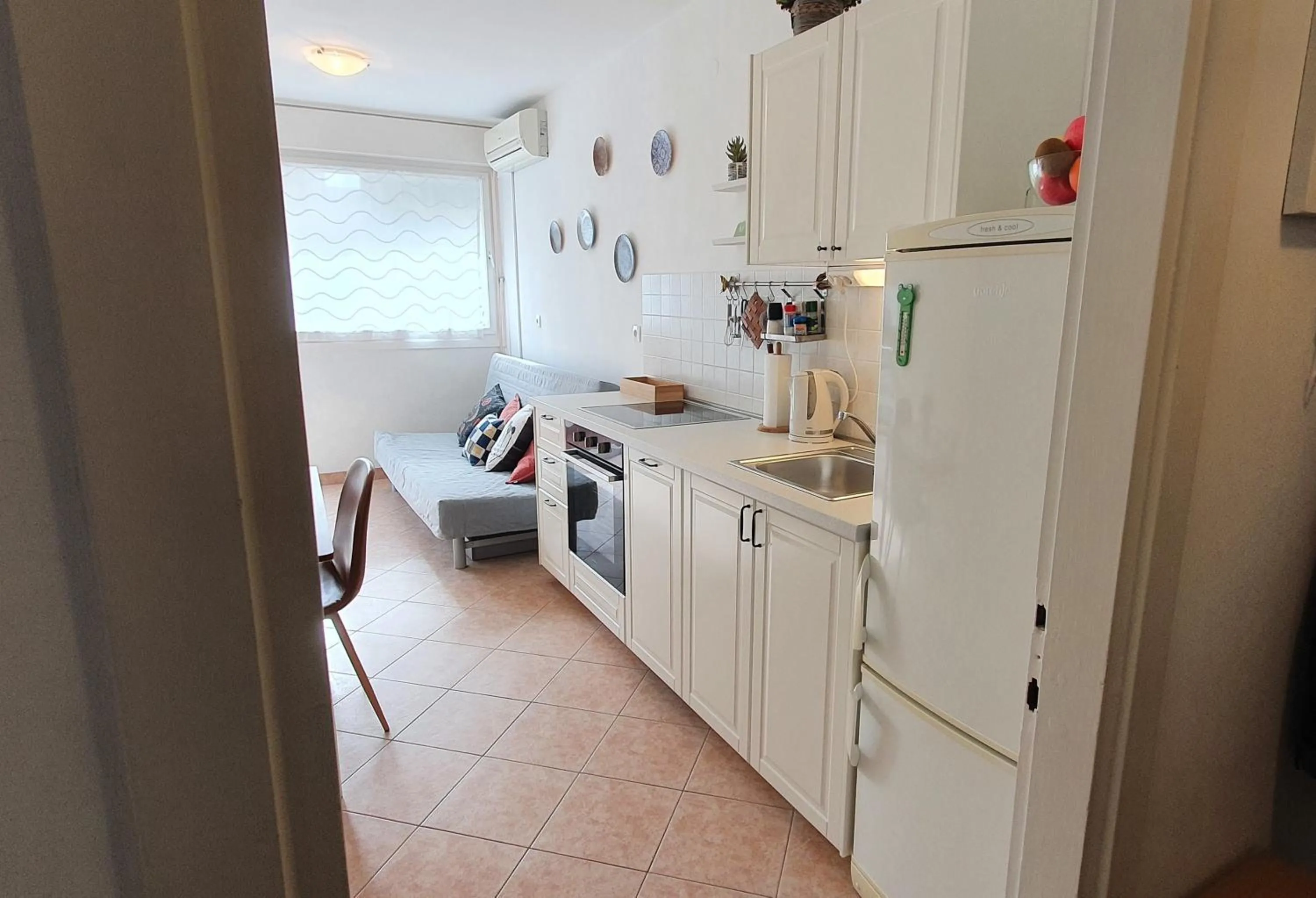 Kitchen or kitchenette in Apartment Romana with a spacious terrace