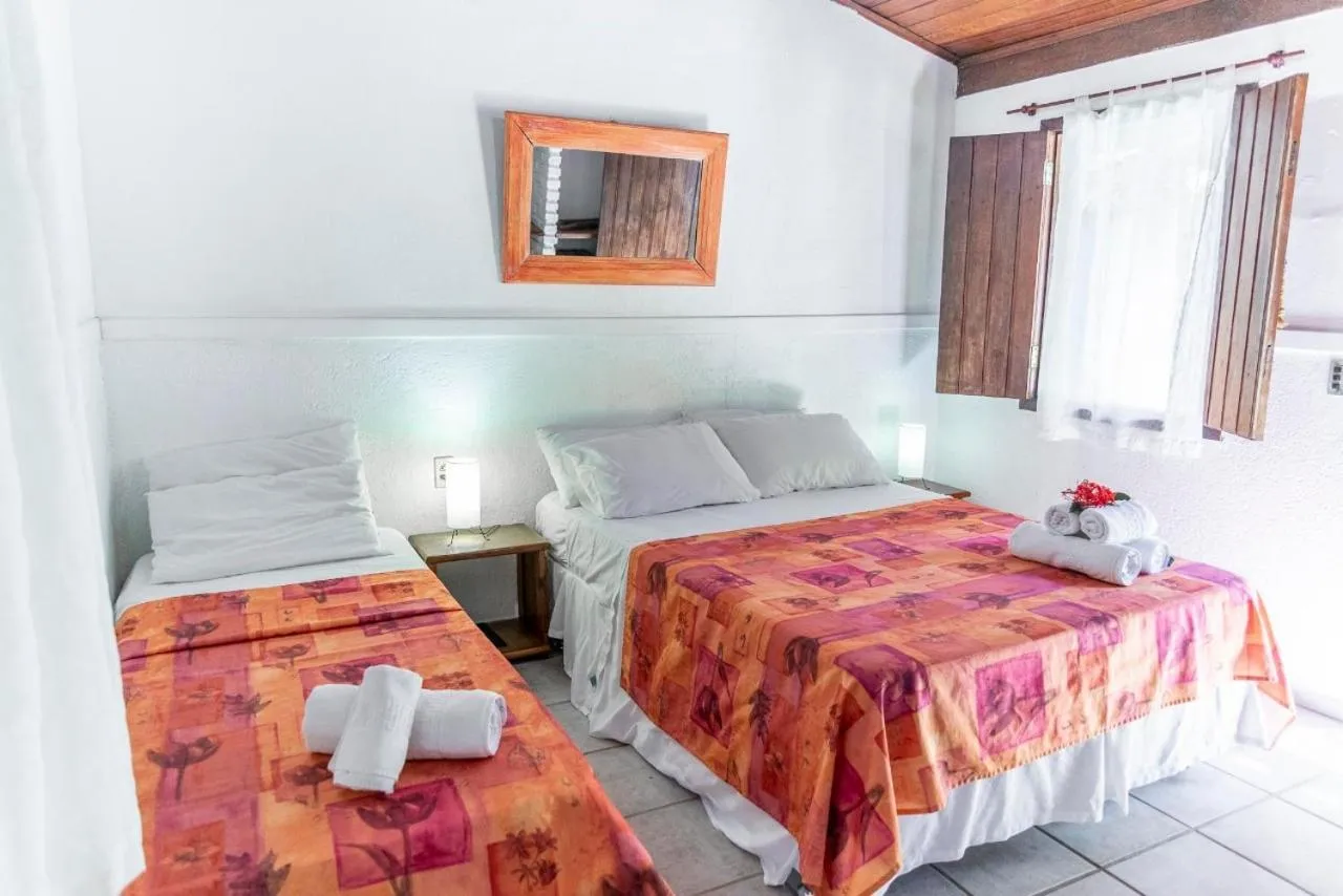 Bed in Pousada Varanda do Sol