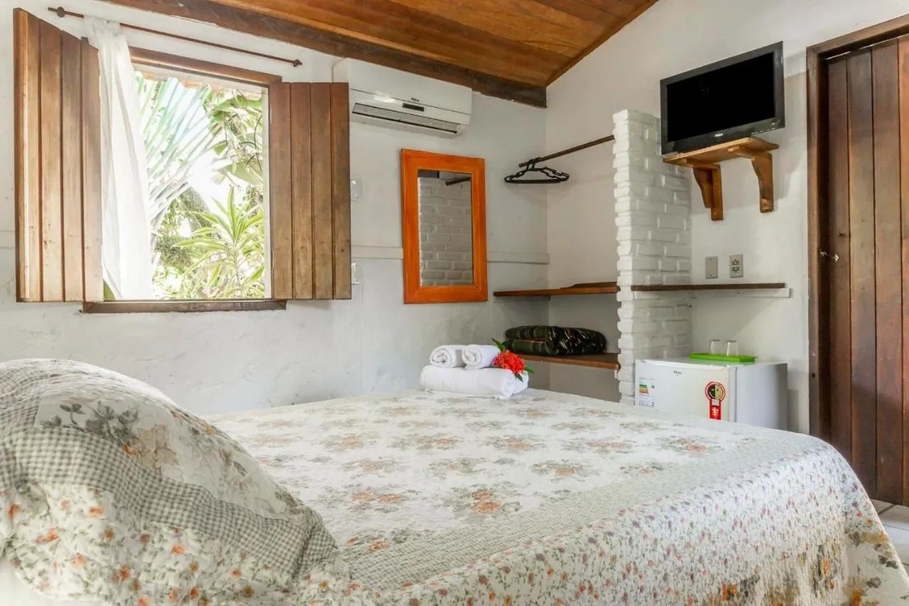 Bed in Pousada Varanda do Sol