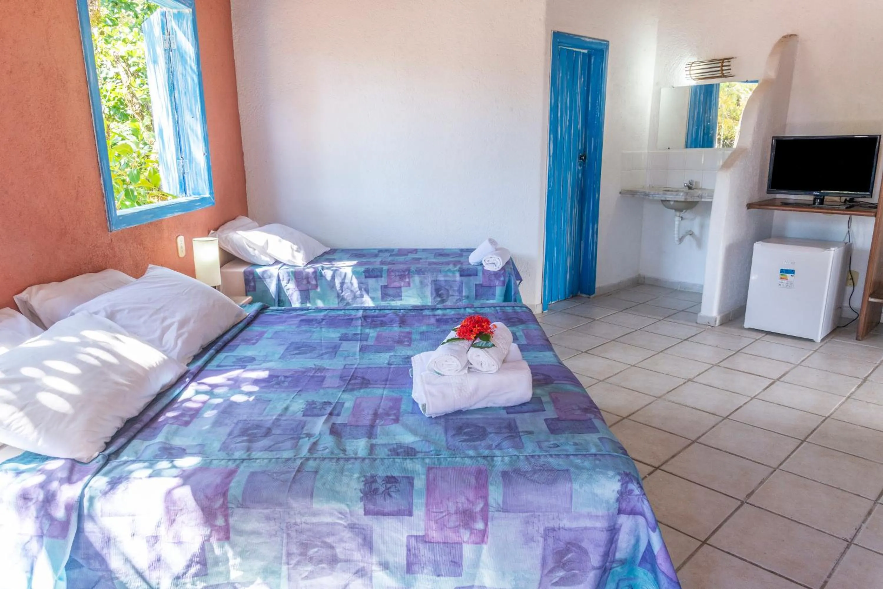 Bed in Pousada Varanda do Sol