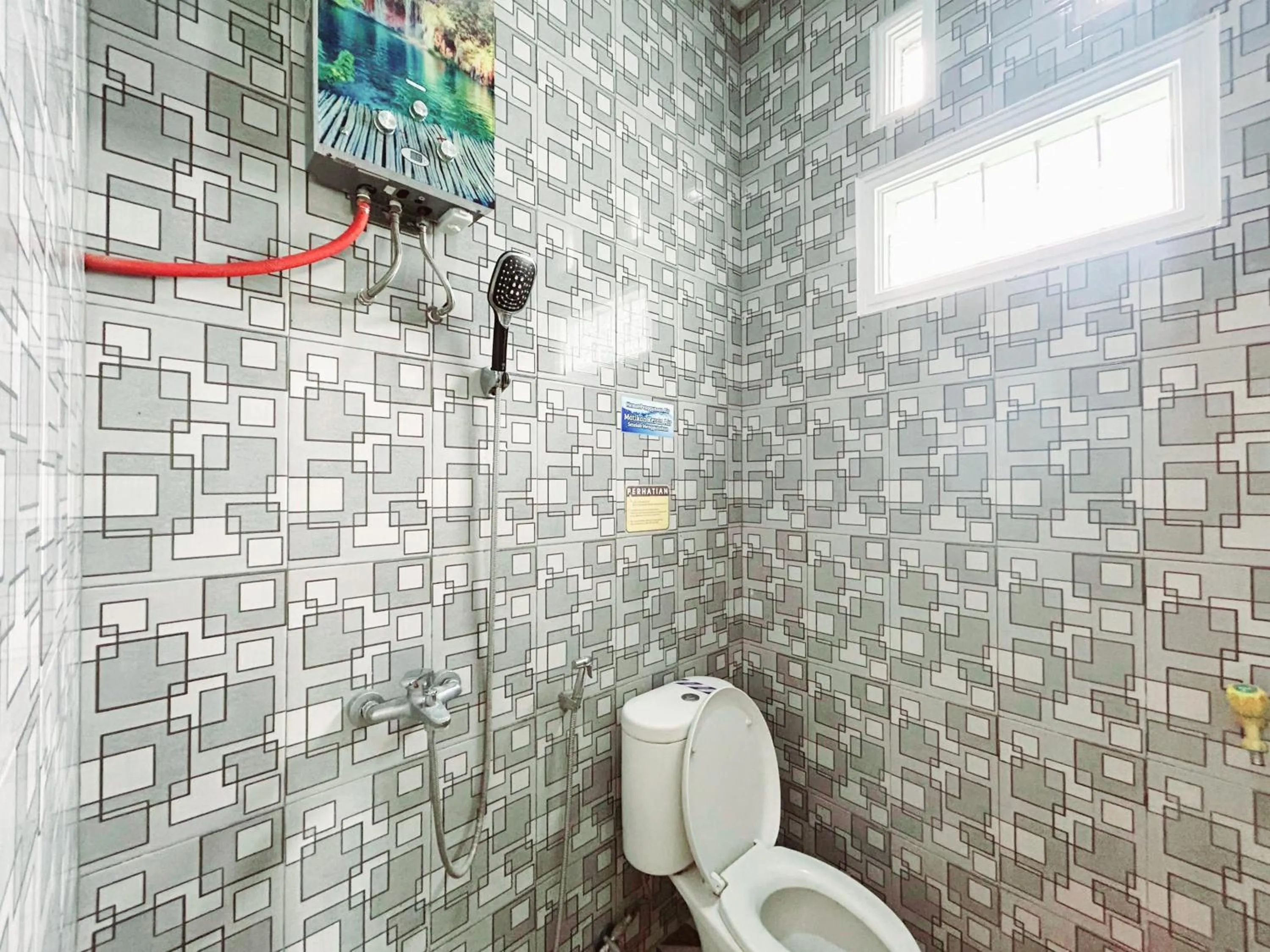 Bathroom in Lancar Homestay Syariah near BNS Mitra RedDoorz