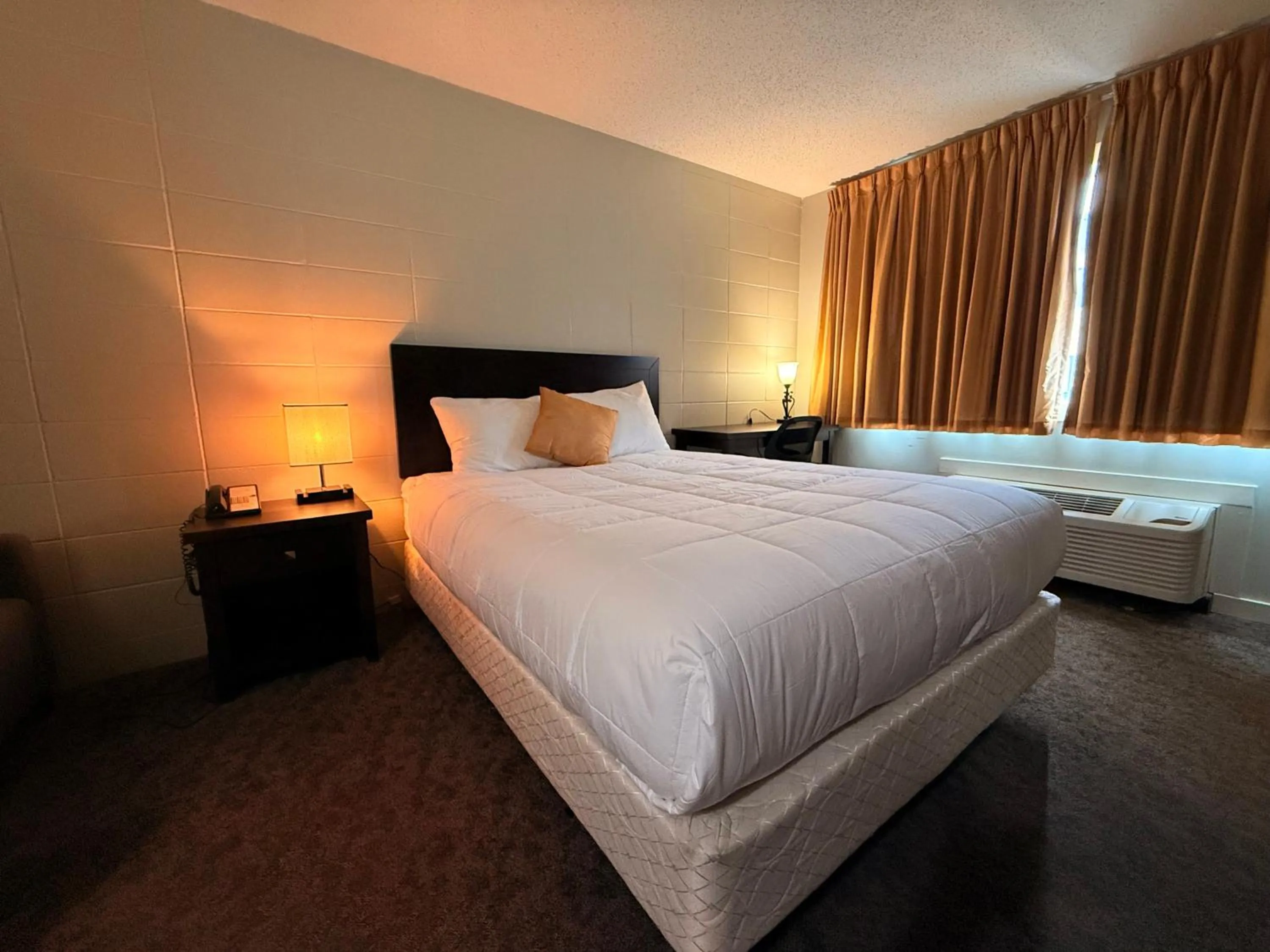 Bed in Capri Motor Inn