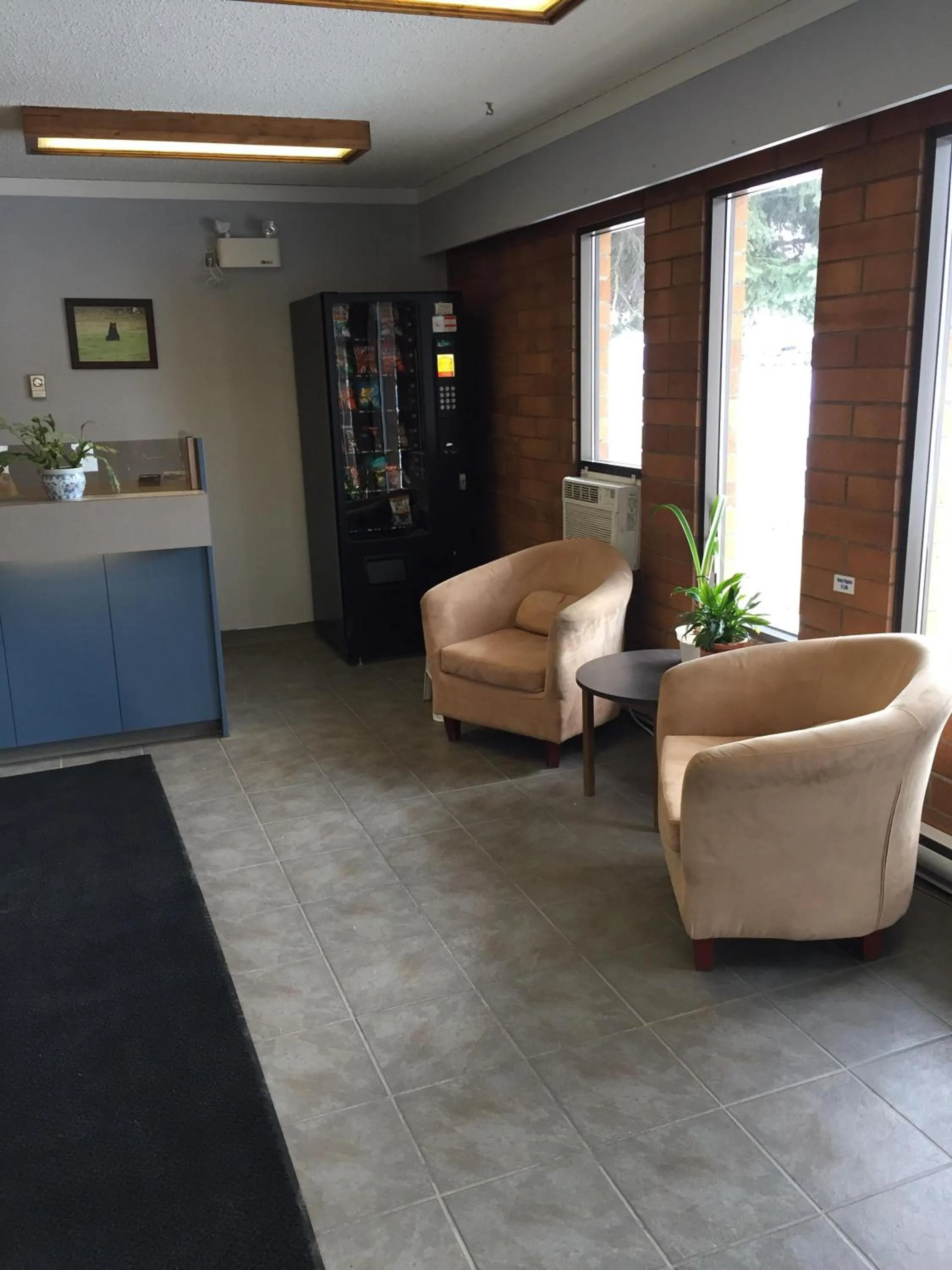 Lobby or reception in Capri Motor Inn